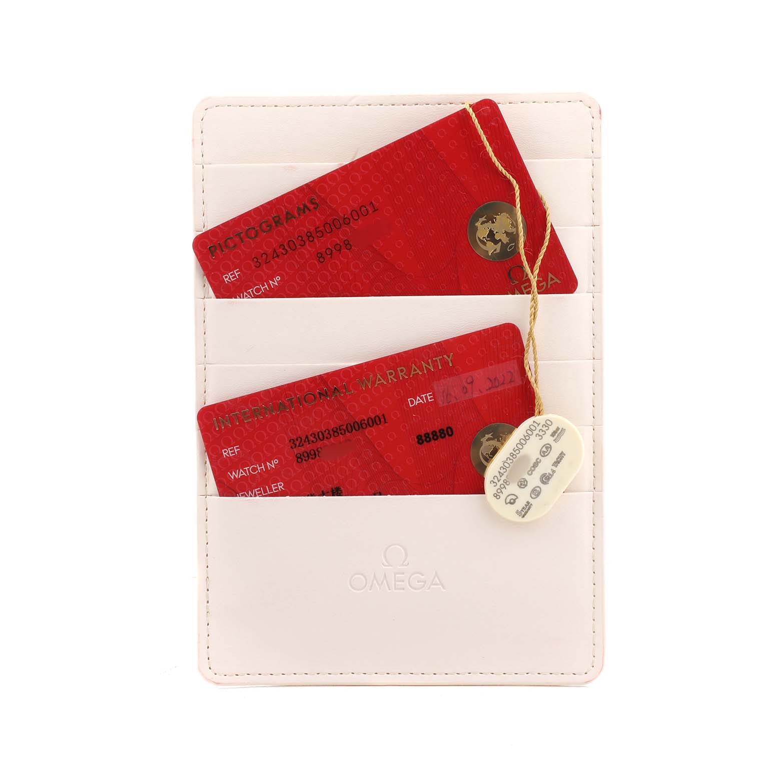 The image shows Omega Speedmaster 324.30.38.50.06.001 Men's Stainless Steel Grey Dial model accessories, including a beige cardholder with red warranty and pictogram cards.