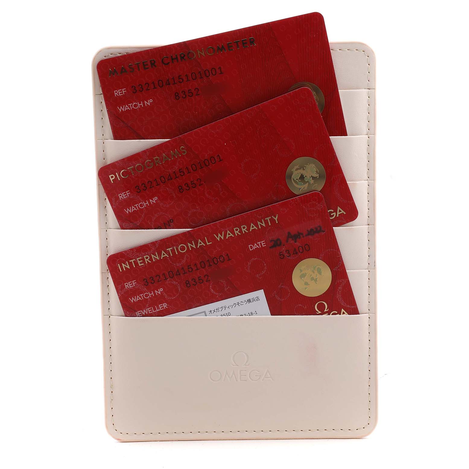 The image shows three Omega Speedmaster 332.10.41.51.01.001 Men's Stainless Steel Black Dial model cards: Master Chronometer, Pictograms, and International Warranty, in a cardholder.