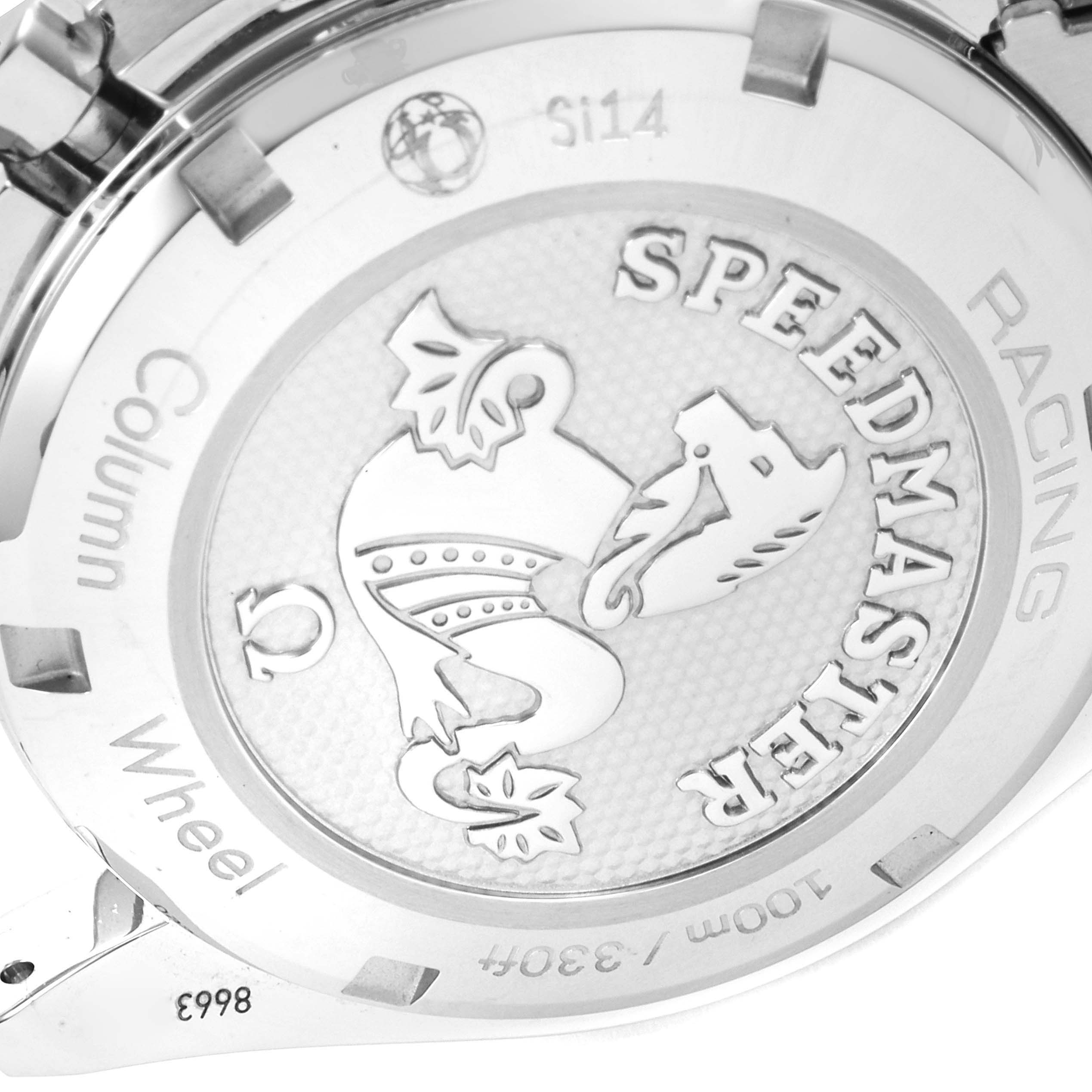 The image shows the case back of an Omega Speedmaster 326.30.40.50.04.001 Men's Stainless Steel White Dial 326.30.40.50.04.001 Men's Stainless Steel White Dial watch, highlighting engravings and the distinctive emblem.