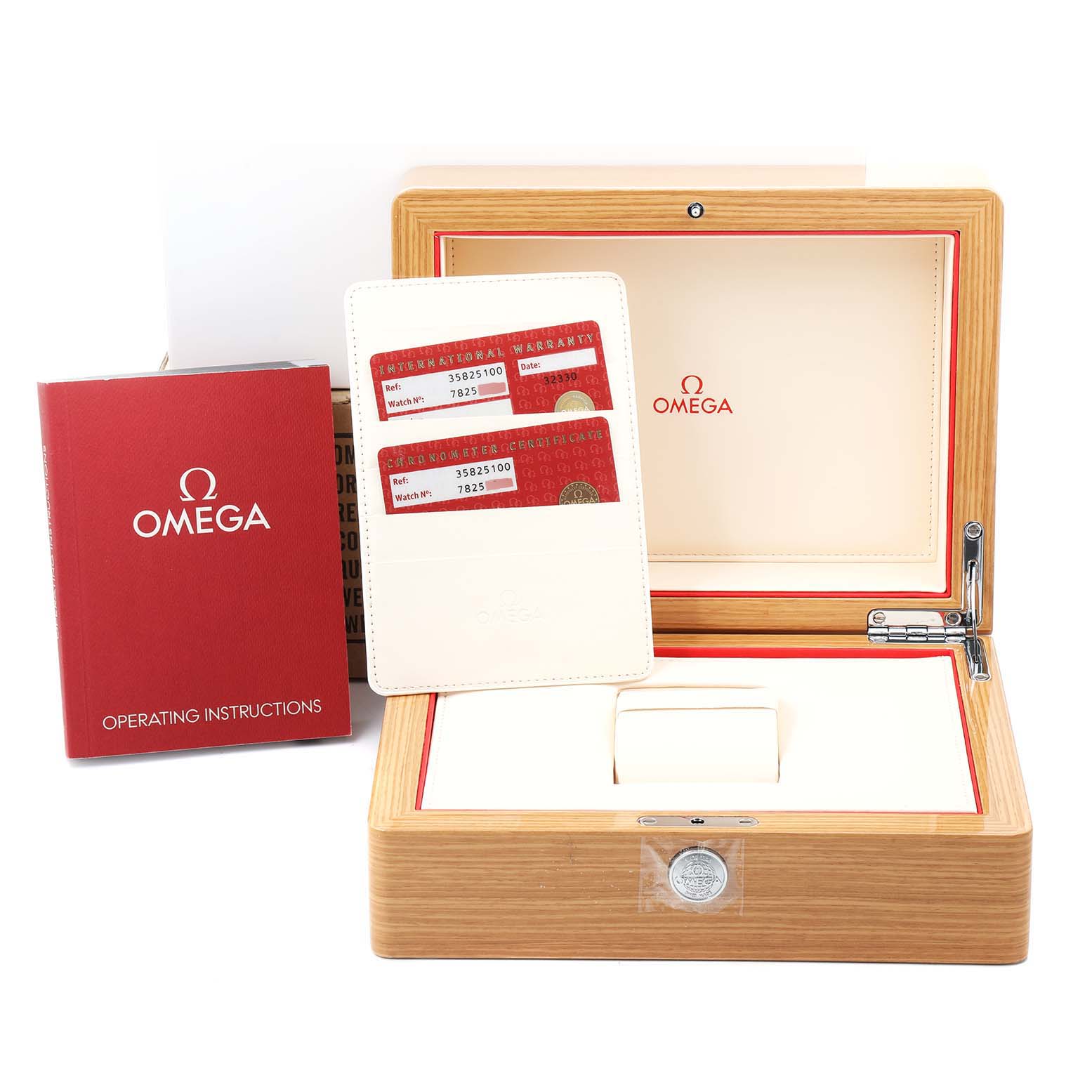 The image shows the Omega Speedmaster 3582.51.00 Men
s Stainless Steel Black Dial 3582.51.00 Men
s Stainless Steel Black Dial
s presentation box, warranty cards, and operating instructions booklet.