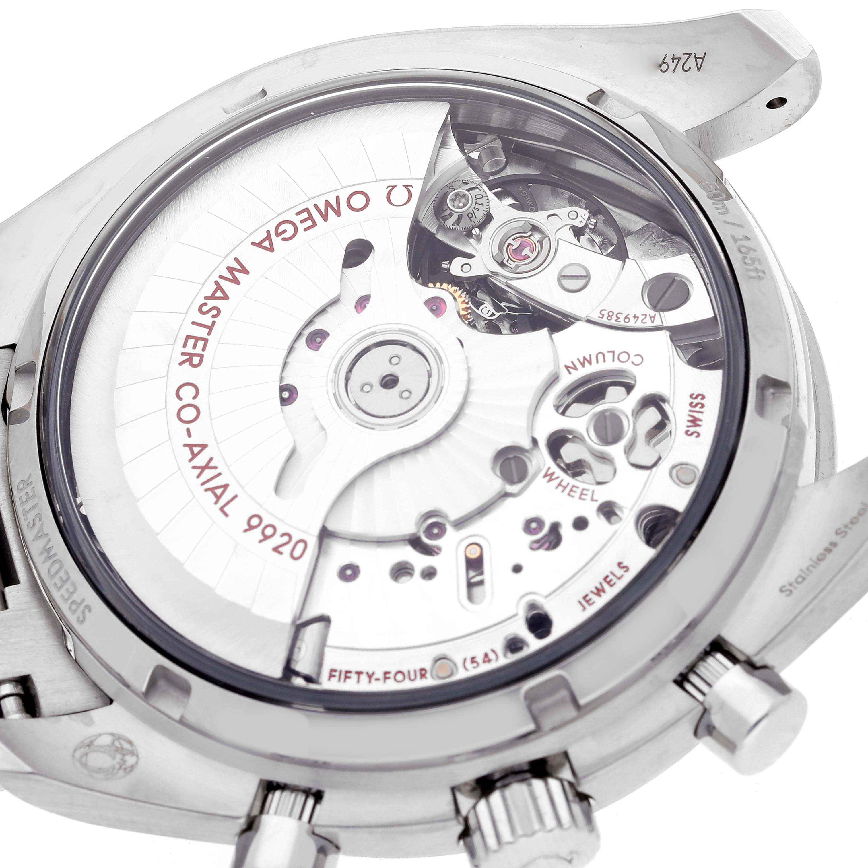 The image shows a close-up of the backside of an Omega Speedmaster 329.30.44.51.01.003 Men's Stainless Steel Black Dial 329.30.44.51.01.003 Men's Stainless Steel Black Dial watch, highlighting the intricate movement and internal parts.