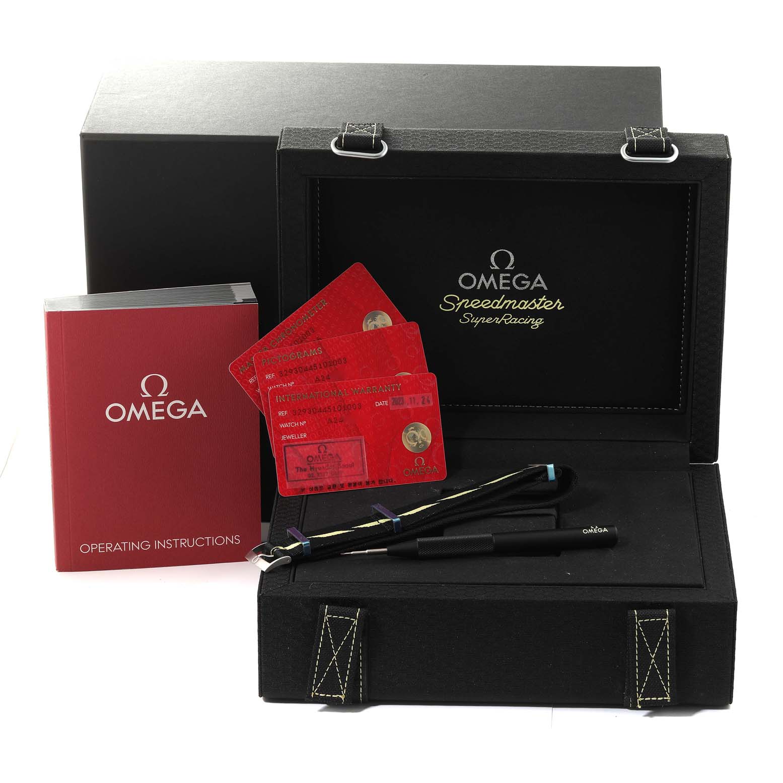 The image shows the complete packaging for an Omega Speedmaster 329.30.44.51.01.003 Men's Stainless Steel Black Dial 329.30.44.51.01.003 Men's Stainless Steel Black Dial watch, including the box, user manual, and warranty cards.