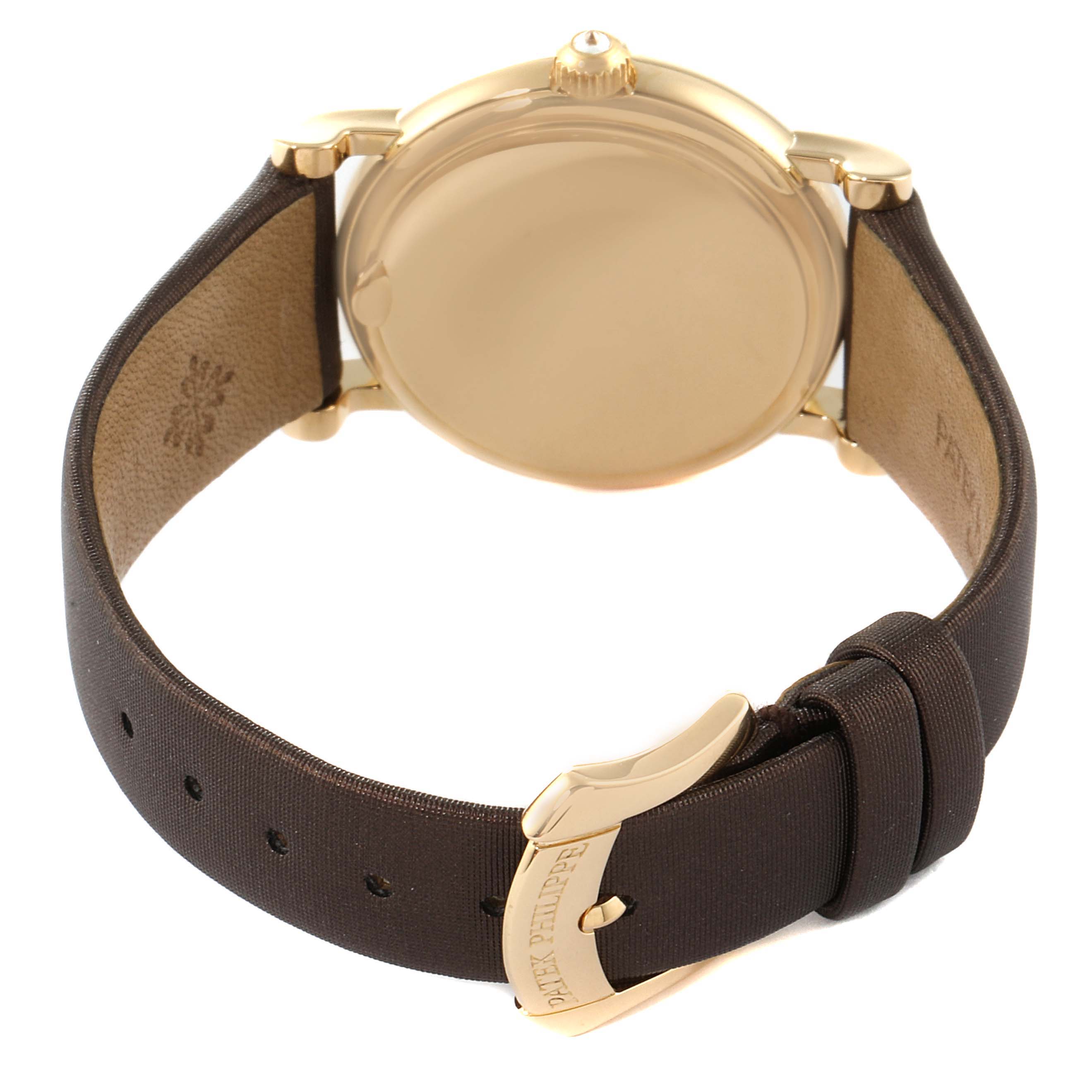The image shows the backside and buckle of a Patek Philippe Calatrava 4858J-010 Women's Yellow Gold Brown Dial 4858J-010 Women's Yellow Gold Brown Dial watch viewed from a rear angle.