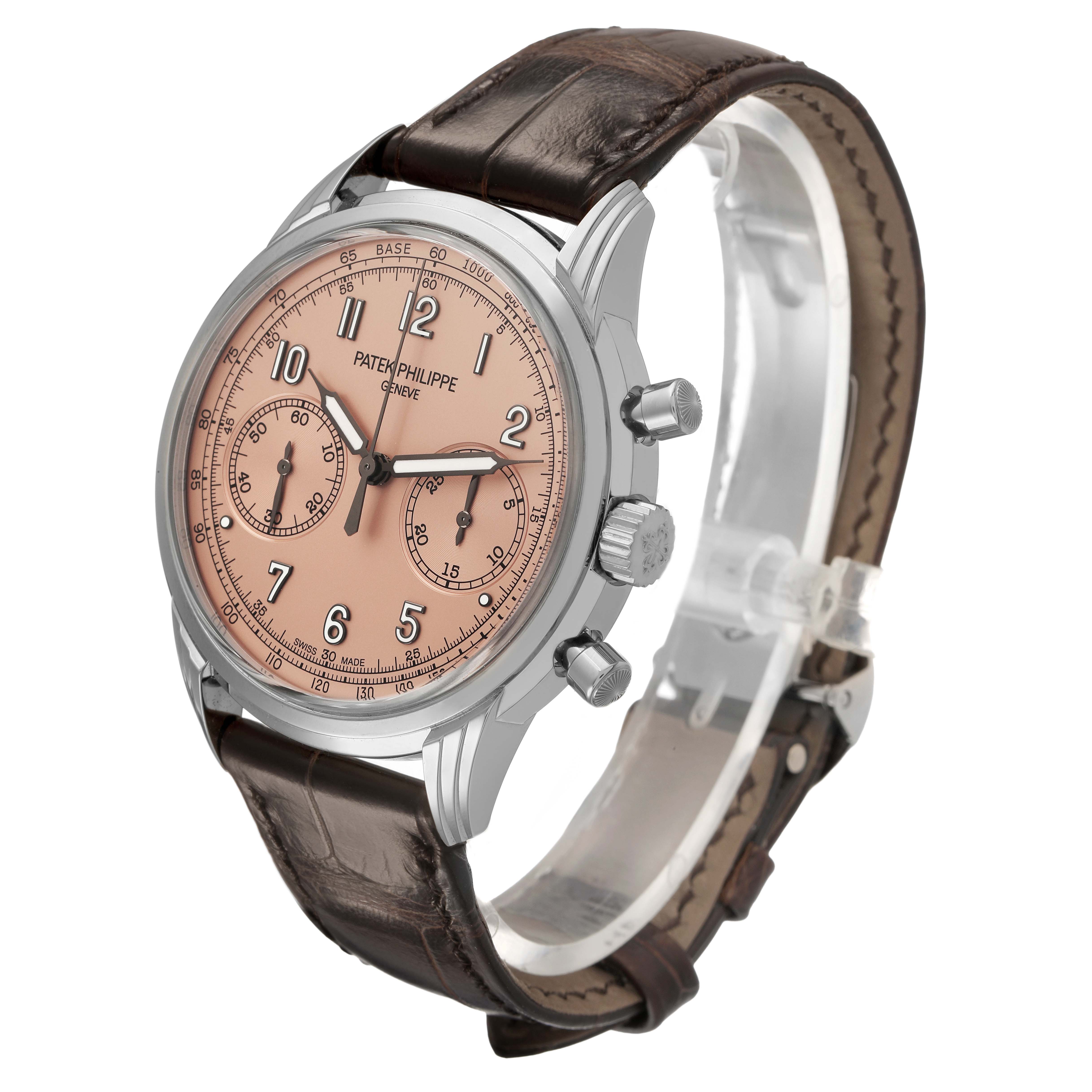 The Patek Philippe Complications 5172G-001 Men's White Gold Pink Dial watch is shown at a slight angle, highlighting its dial, case, pushers, and leather strap.