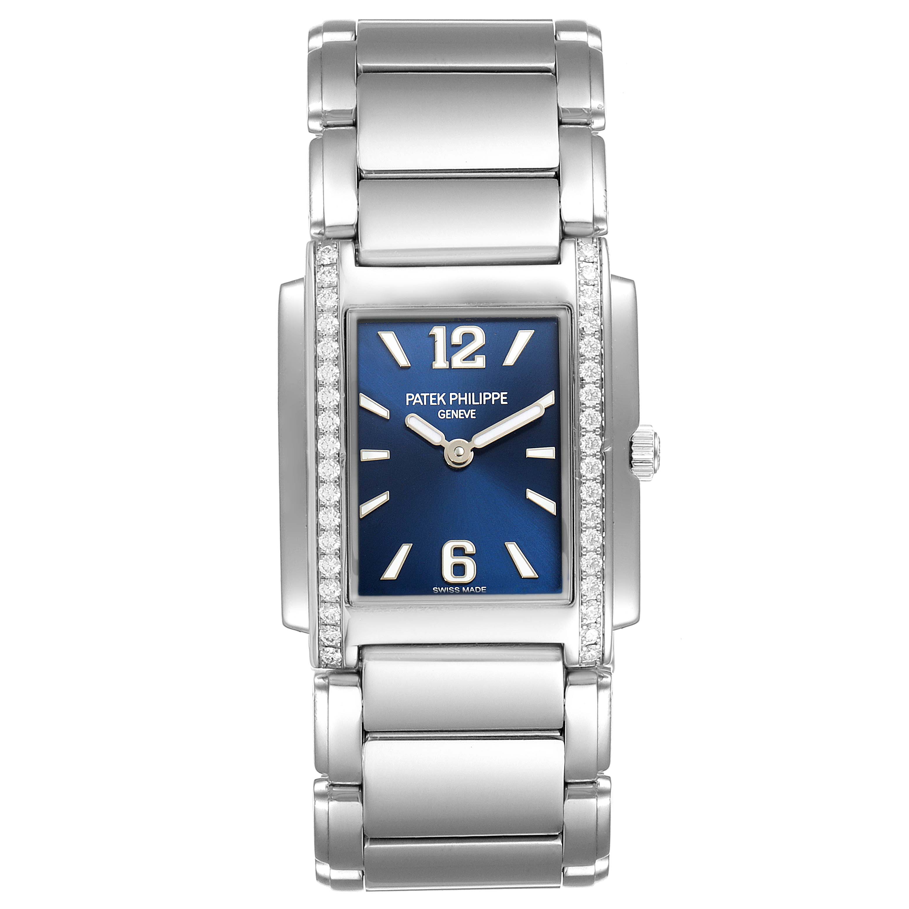 The image shows a front view of the Patek Philippe Twenty-4 4910/1200A Women's Stainless Steel Blue Dial 4910/1200A Women's Stainless Steel Blue Dial model, displaying its rectangular dial, bezel with diamonds, and stainless steel bracelet.