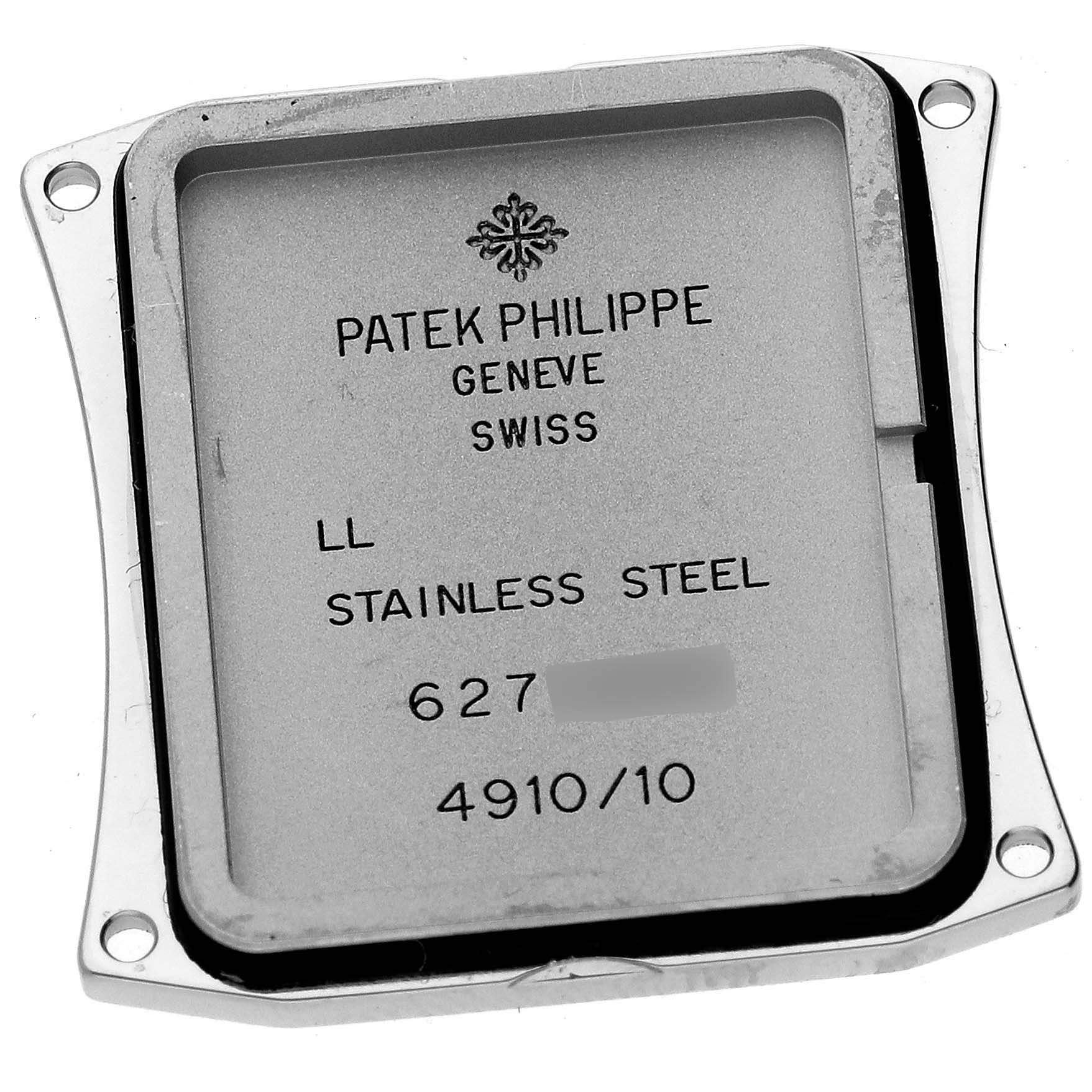 The image shows the back case of a Patek Philippe Twenty-4 4910/10A-012 Women's Stainless Steel Blue Dial 4910/10A-012 Women's Stainless Steel Blue Dial watch, displaying inscriptions and material information.