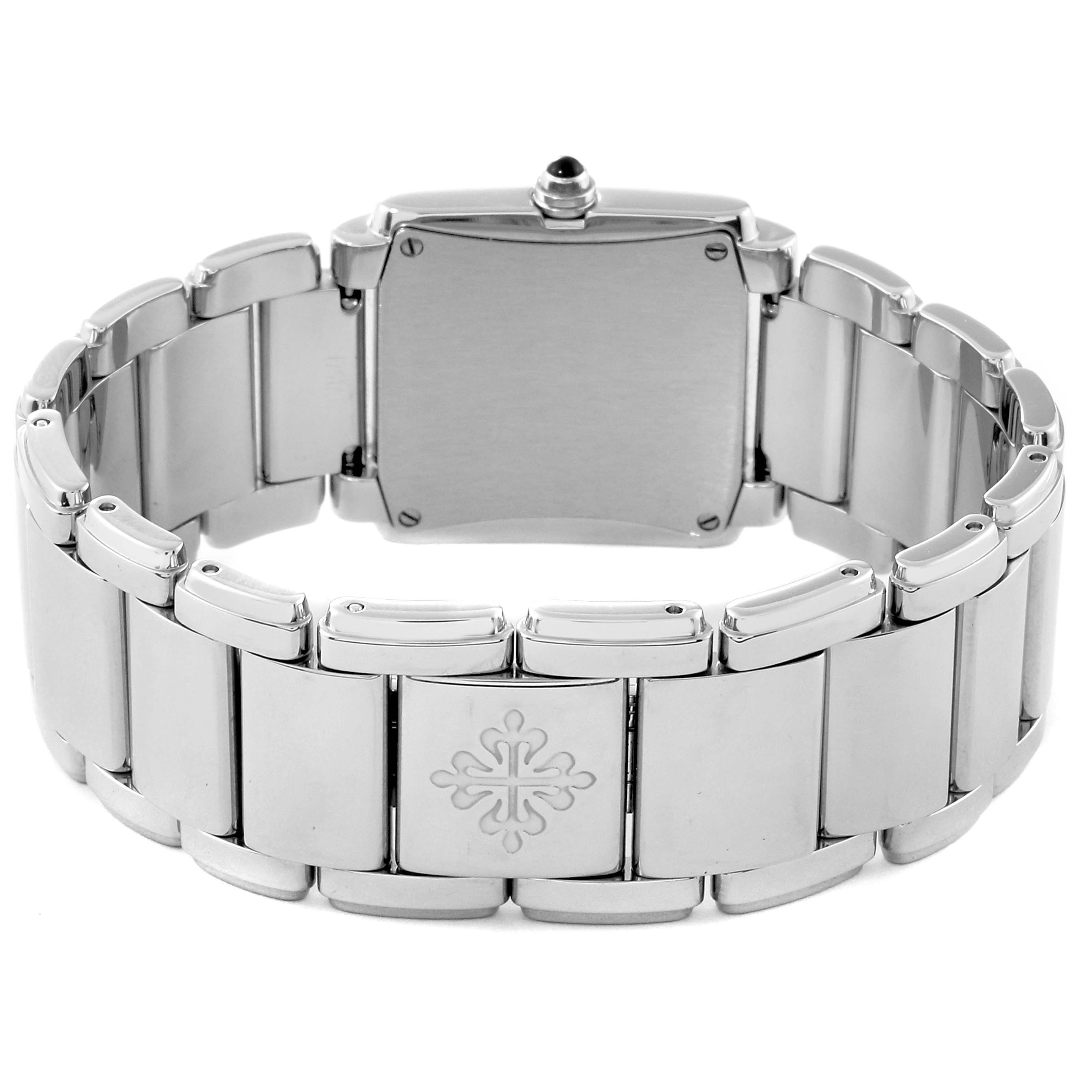 This image shows the back and clasp of a Patek Philippe Twenty-4 4910/10A-012 Women's Stainless Steel Blue Dial 4910/10A-012 Women's Stainless Steel Blue Dial model watch, highlighting its metal bracelet and emblem.