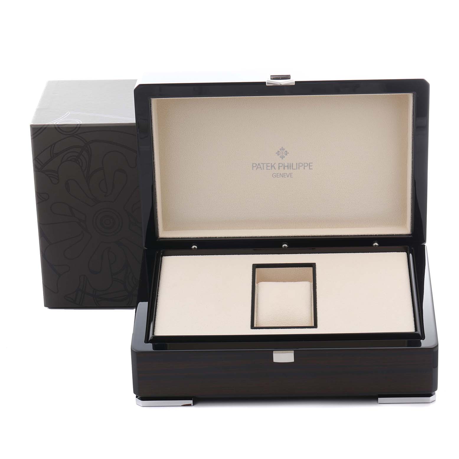 The image shows an open Patek Philippe Complications 5330G-001 Men's White Gold Blue Dial 5330G-001 Men's White Gold Blue Dial watch box from a slight front angle.