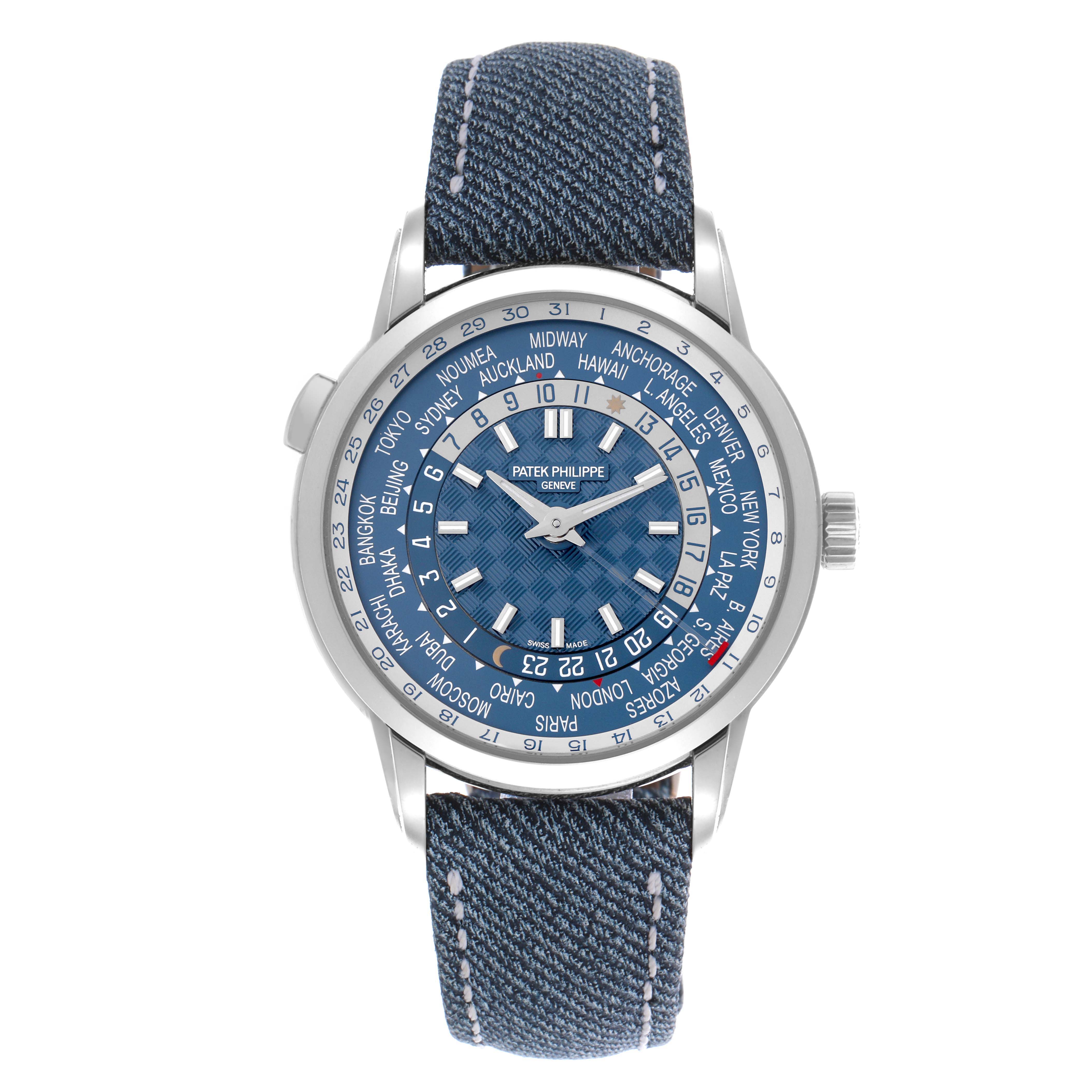 The Patek Philippe Complications 5330G-001 Men's White Gold Blue Dial 5330G-001 Men's White Gold Blue Dial watch is shown from the front, displaying its face and denim strap.