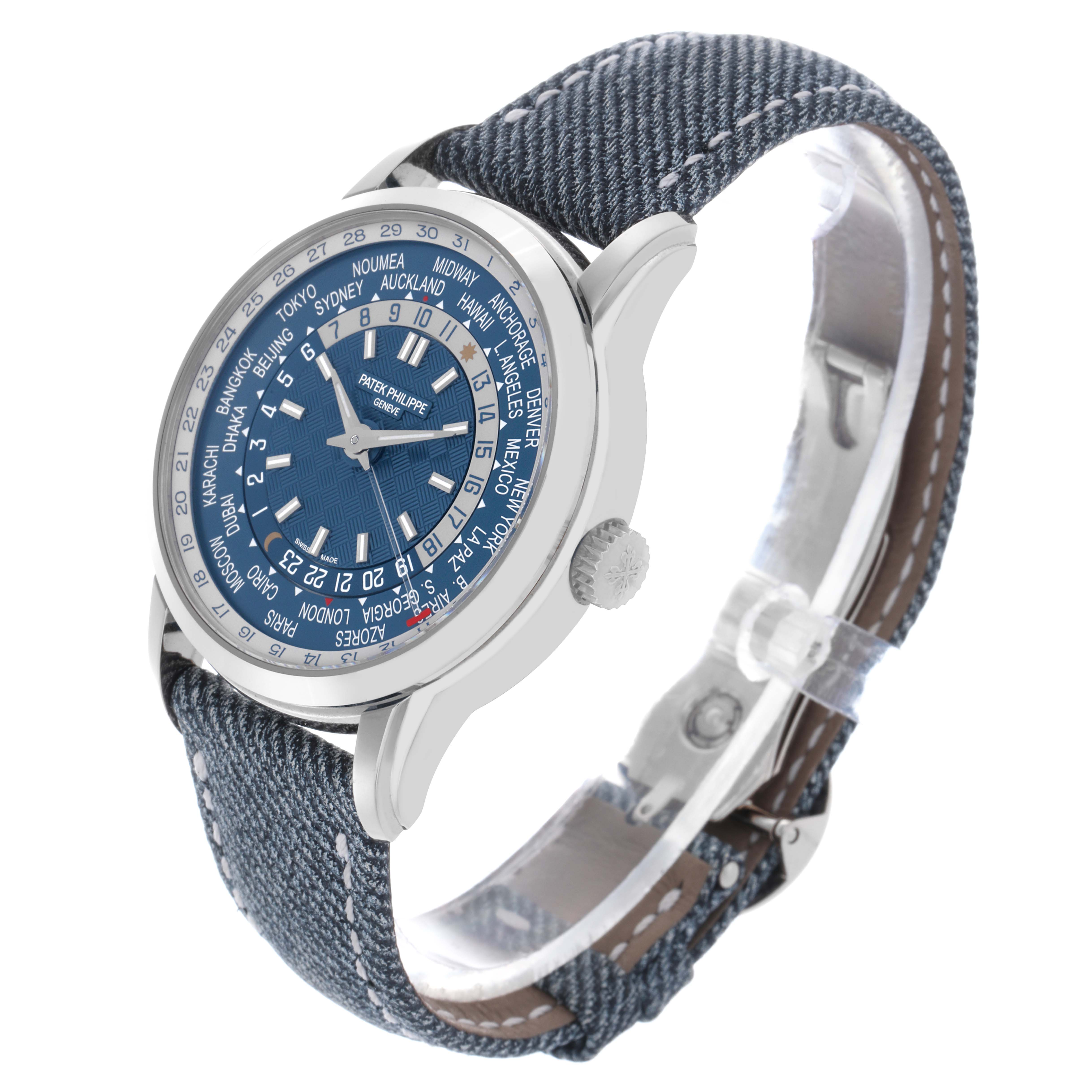 The Patek Philippe Complications 5330G-001 Men's White Gold Blue Dial 5330G-001 Men's White Gold Blue Dial watch is shown at an angled side view, highlighting the face, strap, and crown.