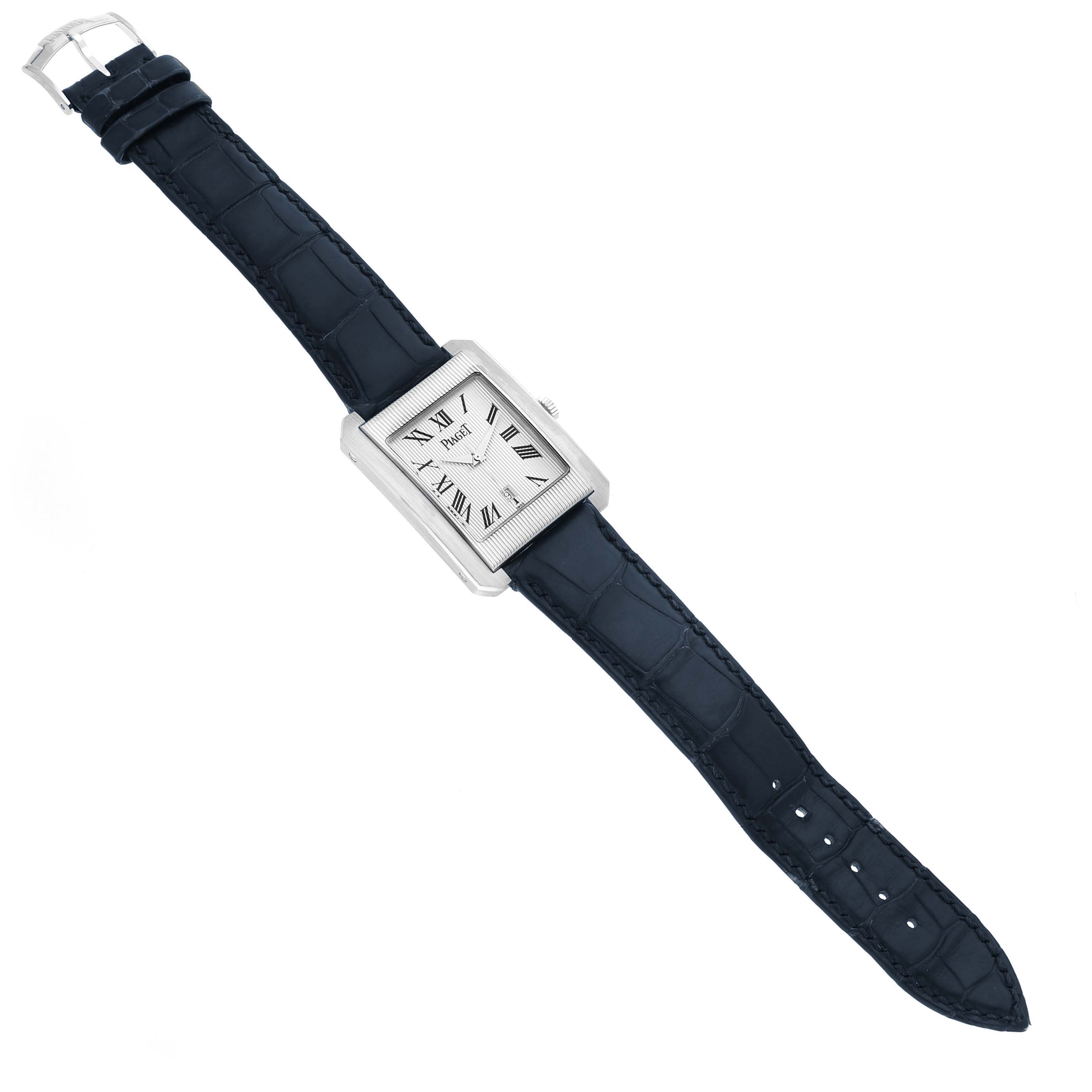 The Piaget 26100 Men's White Gold Silver Dial Protocole XL 26100 watch is shown from an overhead angle, displaying the full face, strap, and buckle.