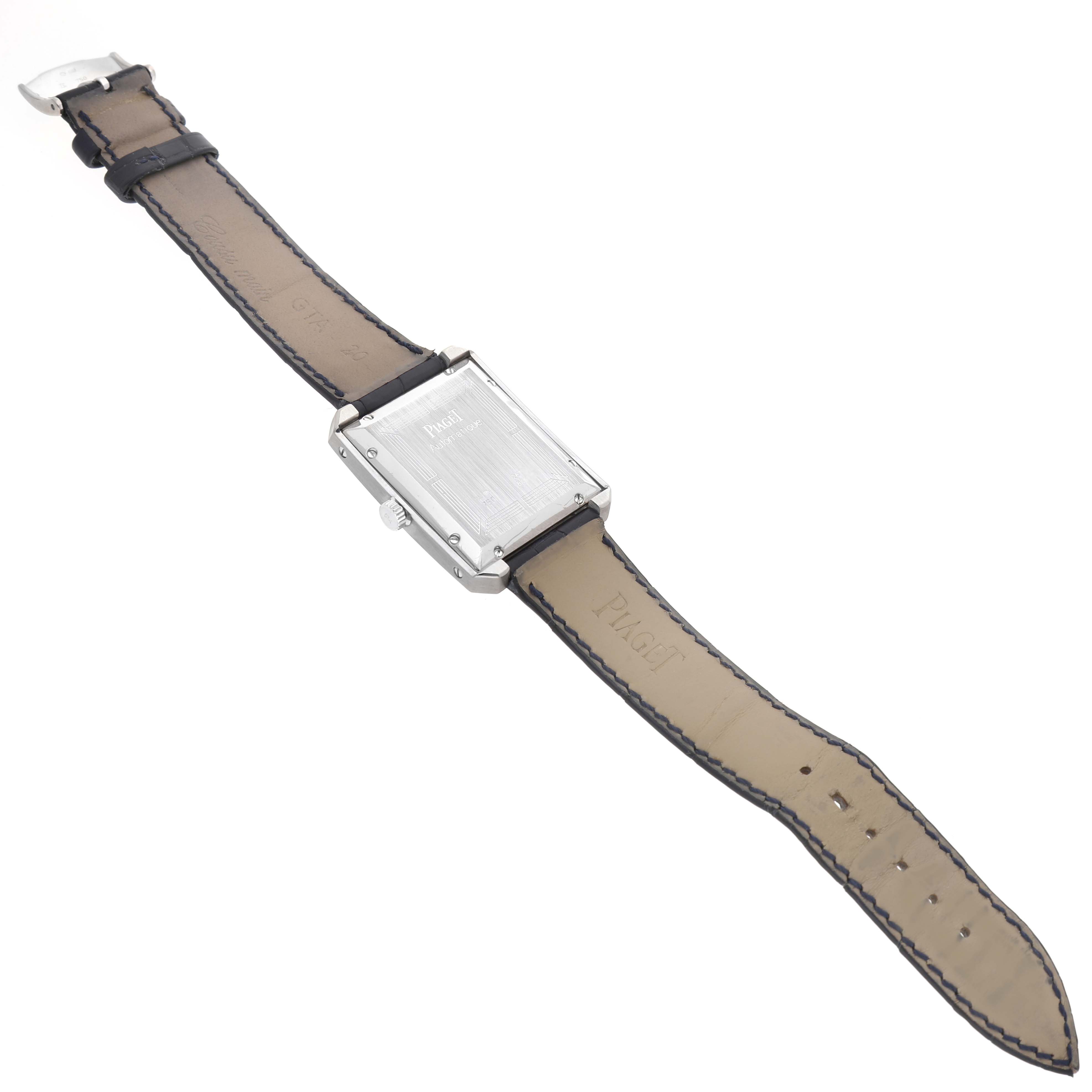 The image shows the back of the Piaget 26100 Men's White Gold Silver Dial Protocole XL 26100 watch, including the case back, strap, and buckle.