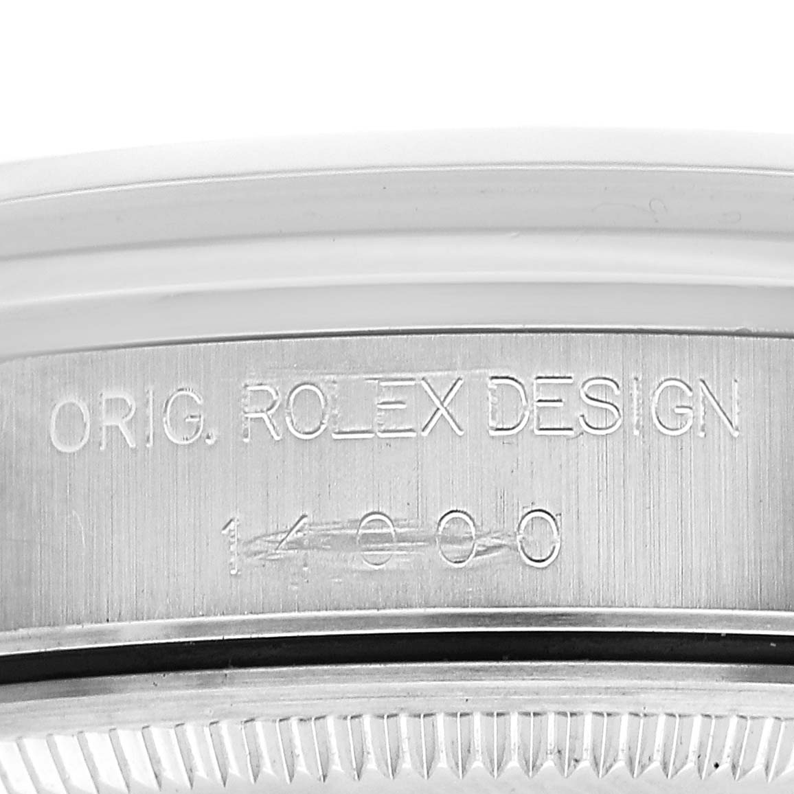The image shows the engraved side of a Rolex Air-King 14000 Men's Stainless Steel Silver Dial watch case, highlighting "ORIG. ROLEX DESIGN" and the model number.