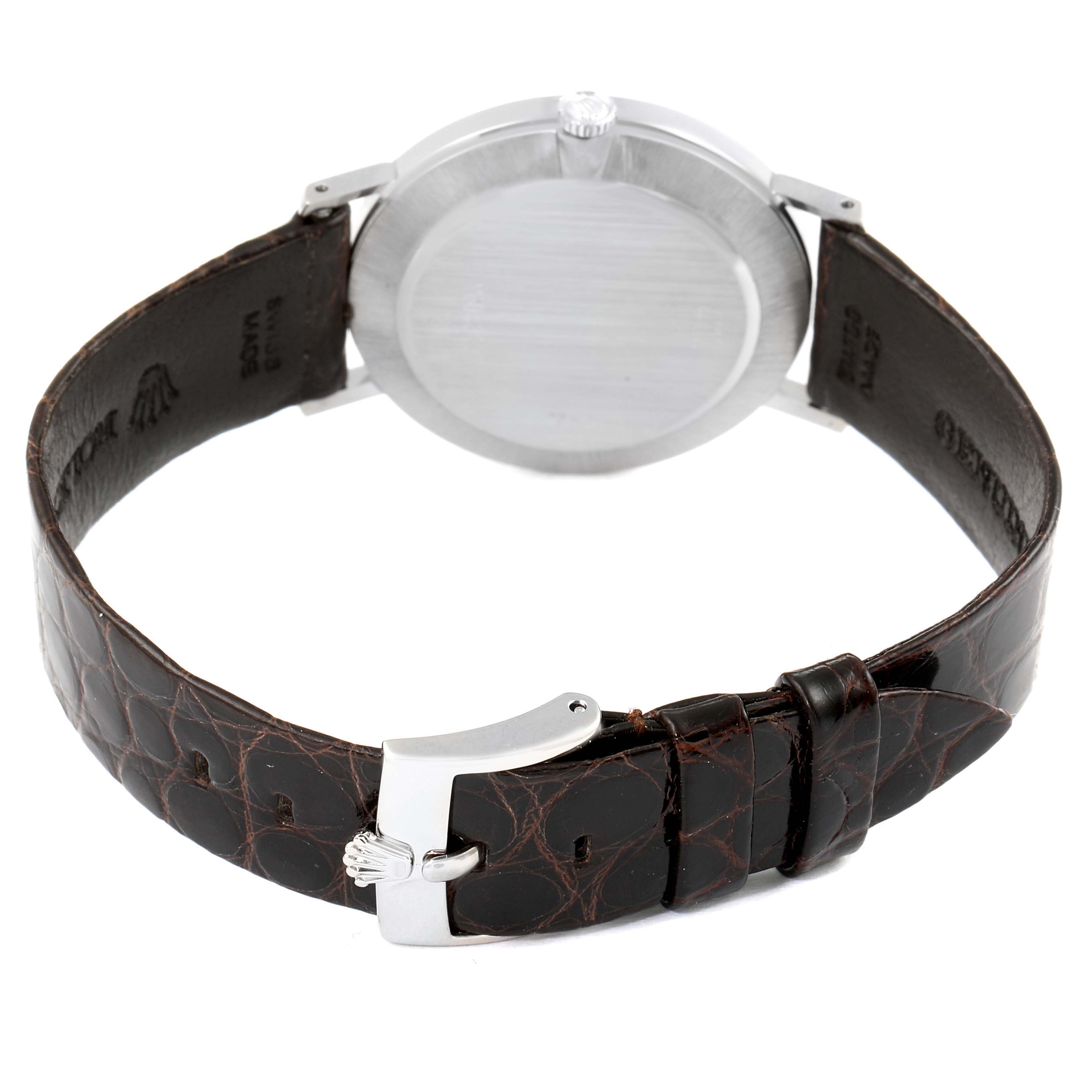 The image shows the back view of a Rolex Cellini 4112 Men's White Gold Silver Dial 4112 Men's White Gold Silver Dial watch, highlighting the case back and leather strap with buckle.