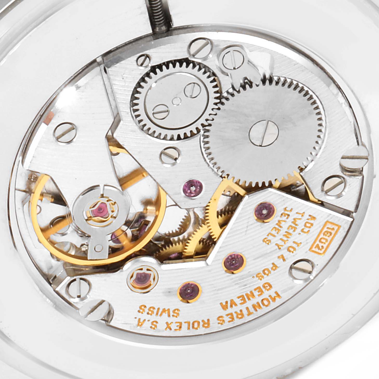 This image shows the intricate internal mechanics of a Rolex Cellini 4112 Men's White Gold Silver Dial 4112 Men's White Gold Silver Dial model's movement from a close-up angle.
