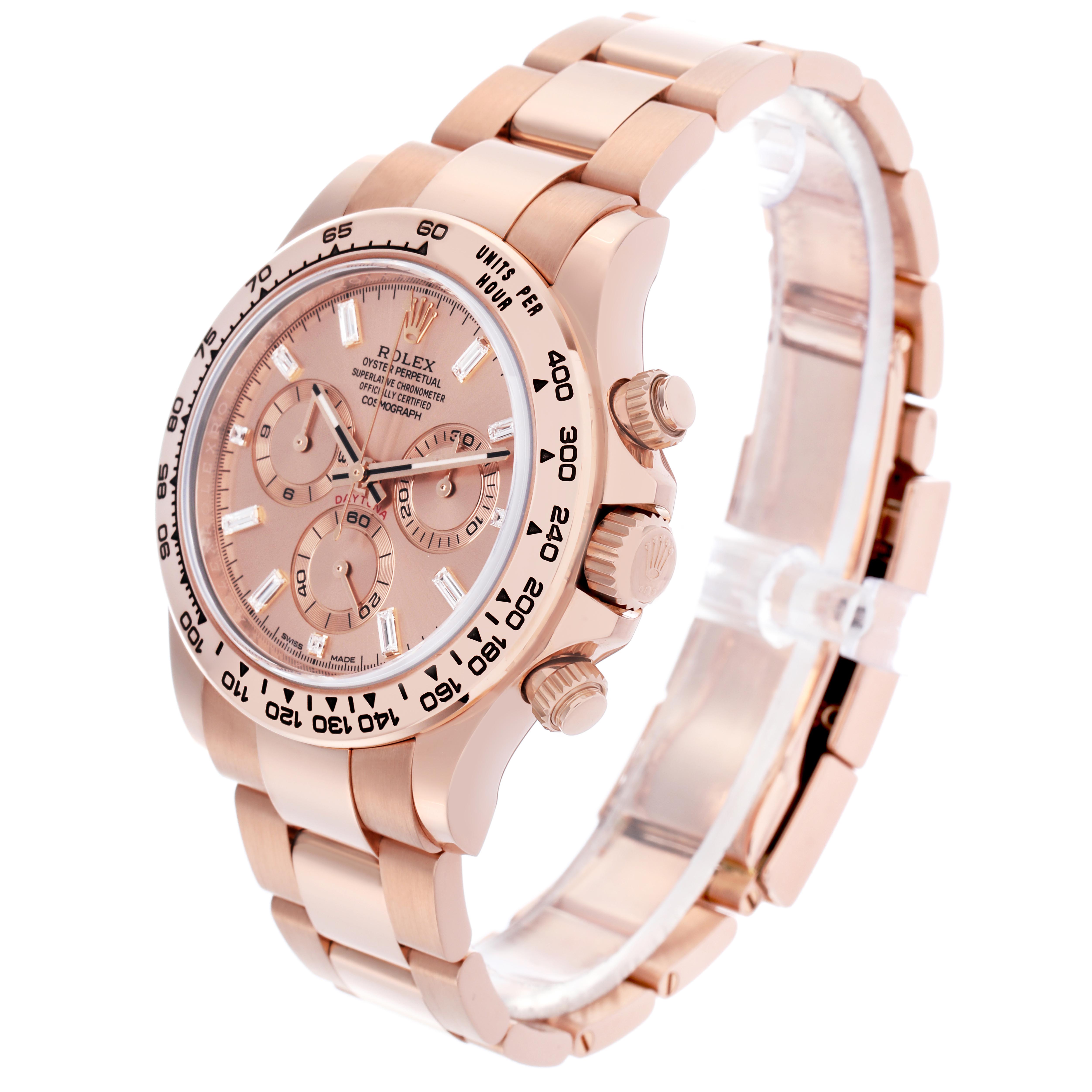 The Rolex Daytona 116505 Men
s Rose Gold Pink Dial 116505 Men
s Rose Gold Pink Dial watch is shown at a slight angle, highlighting the dial, bezel, crown, pushers, and bracelet.
