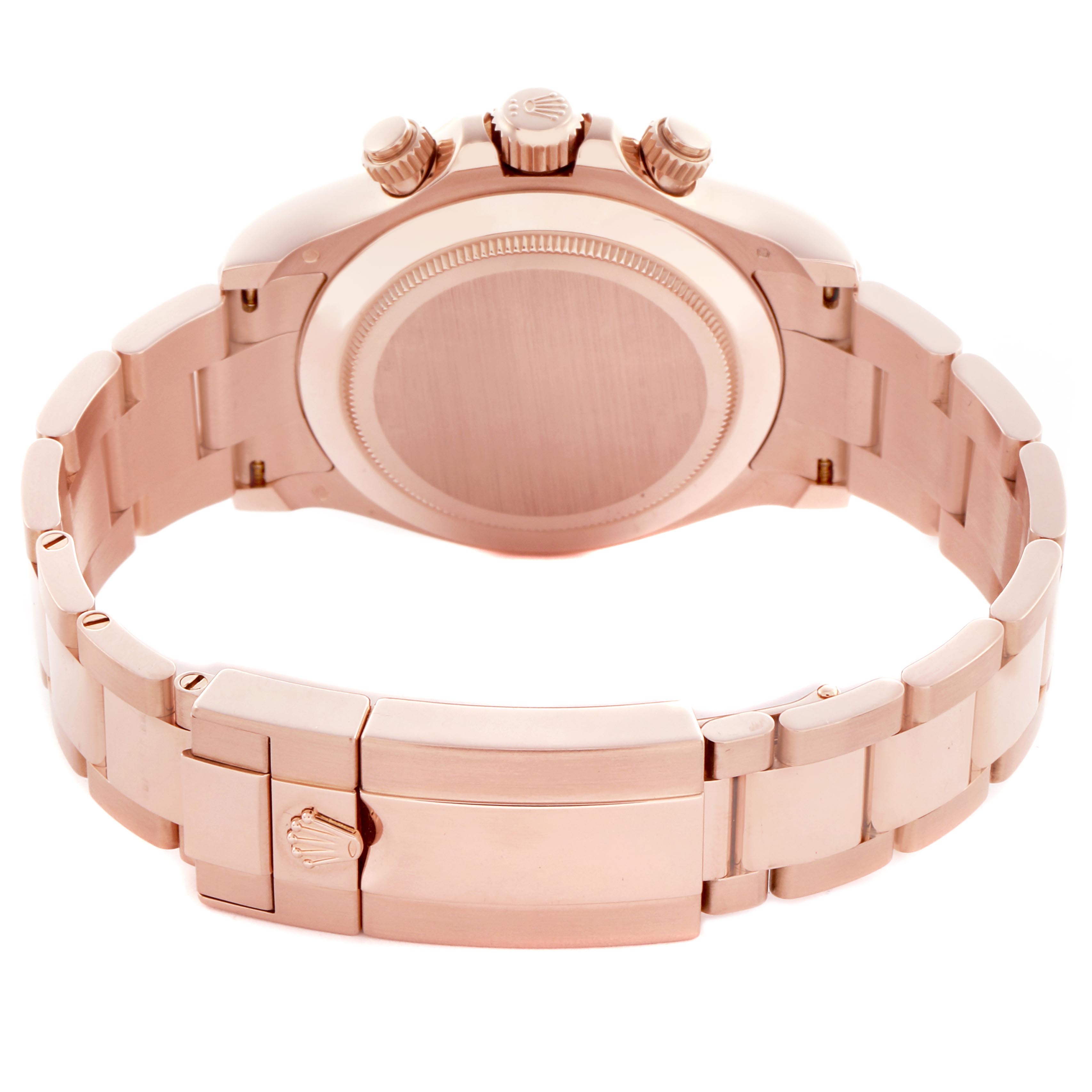 The image shows the back view of a Rolex Daytona 116505 Men
s Rose Gold Pink Dial 116505 Men
s Rose Gold Pink Dial watch, focusing on the case back, crown, pushers, and bracelet clasp.