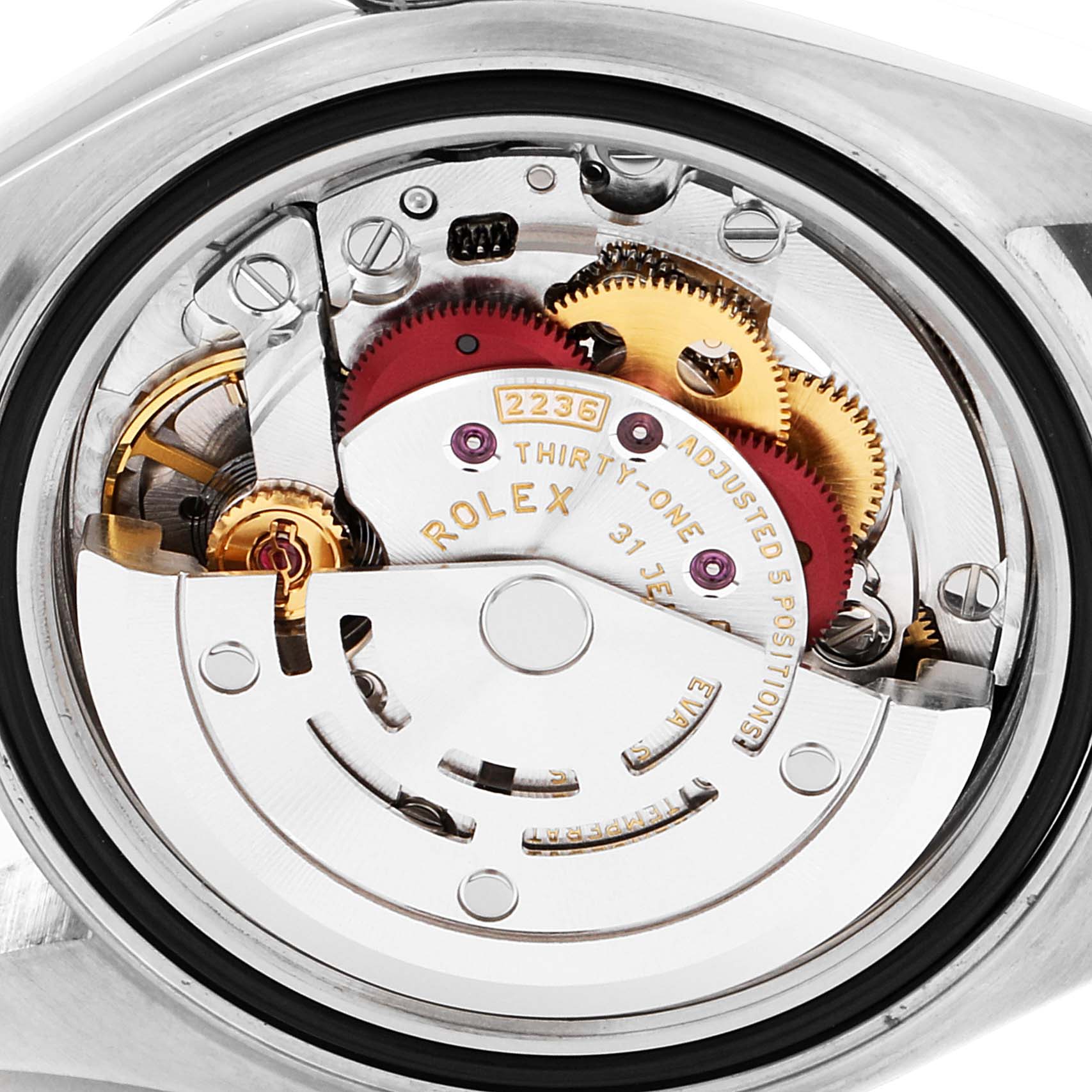 This image shows the intricate internal mechanism of a Rolex Datejust 279160 Women's Stainless Steel Grey Dial 279160 Women's Stainless Steel Grey Dial watch, highlighting gears and the rotor.