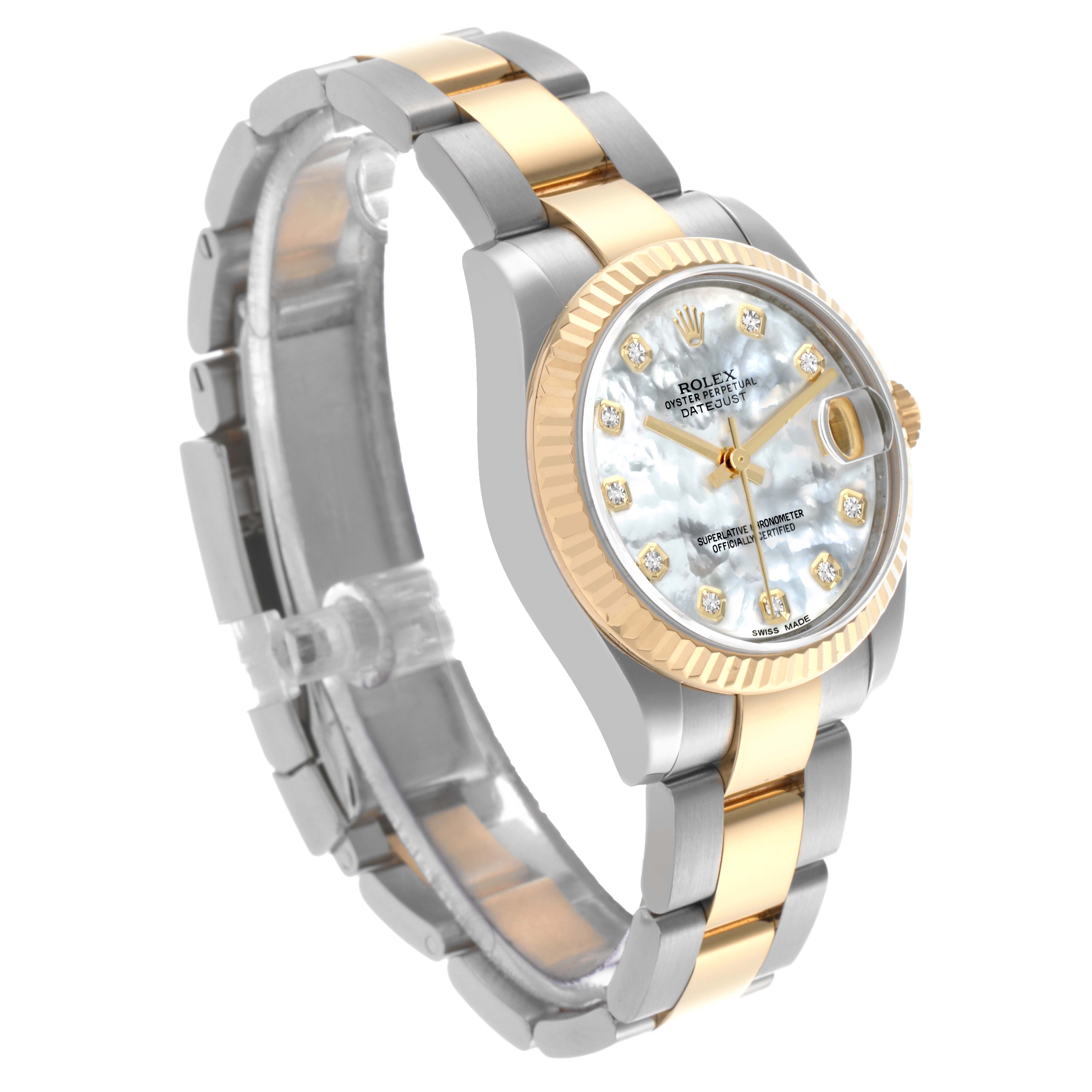 The Rolex Mid-Size 178273 Women's Steel and Gold (two tone) Mother of Pearl Dial 178273 Women's Steel and Gold (two tone) Mother of Pearl Dial watch is shown at an oblique angle, highlighting the face with diamond markers, fluted bezel, and two-tone bracelet.