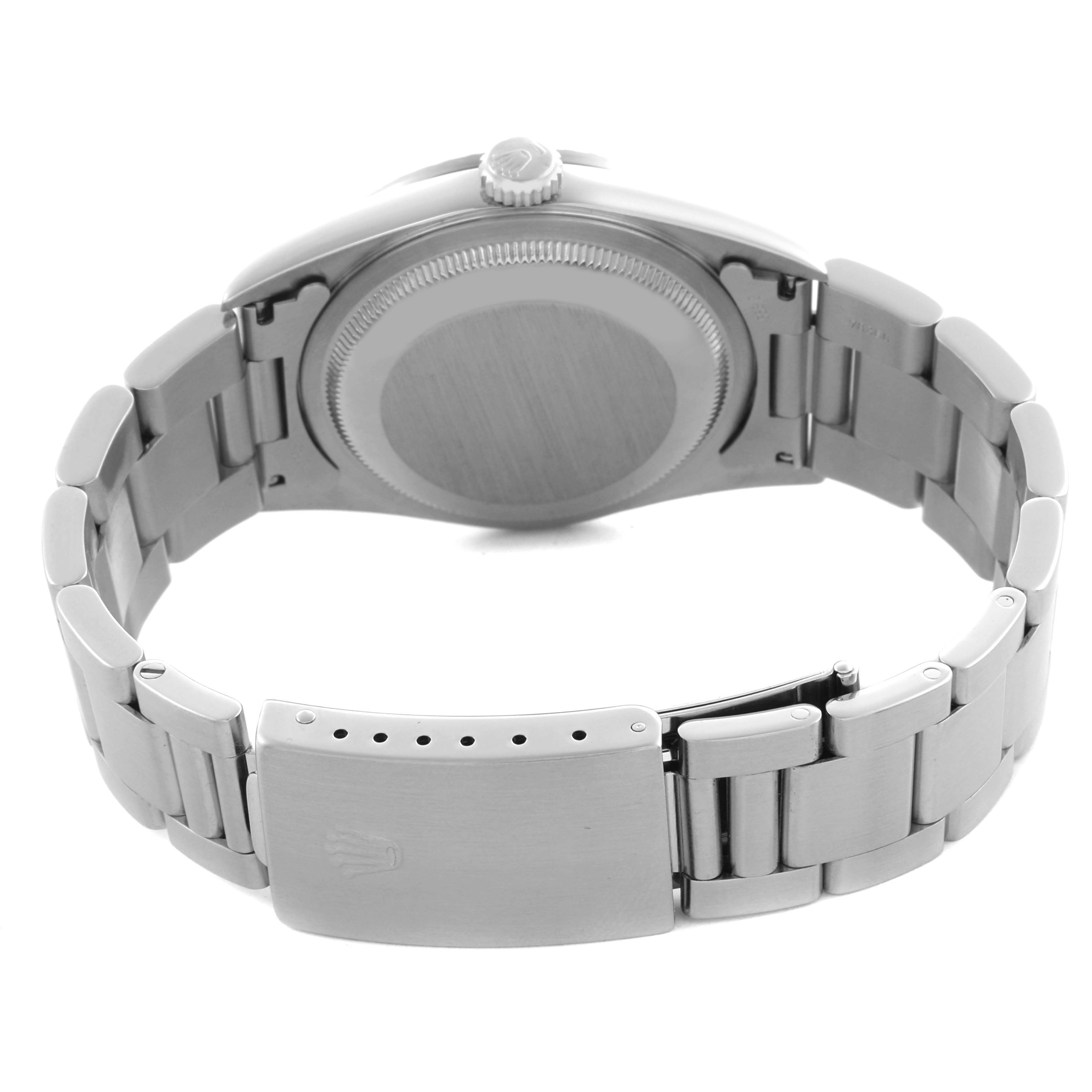 The image shows the back of a Rolex Datejust 16220 Men's Stainless Steel Pink Dial 16220 Men's Stainless Steel Pink Dial, highlighting the case, bracelet, and closed clasp.