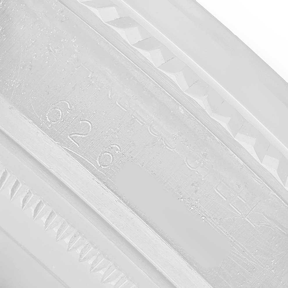 The image shows a close-up of the inner bezel with engravings for the Rolex Vintage Collection 16014 Men's Stainless Steel Silver Dial model.