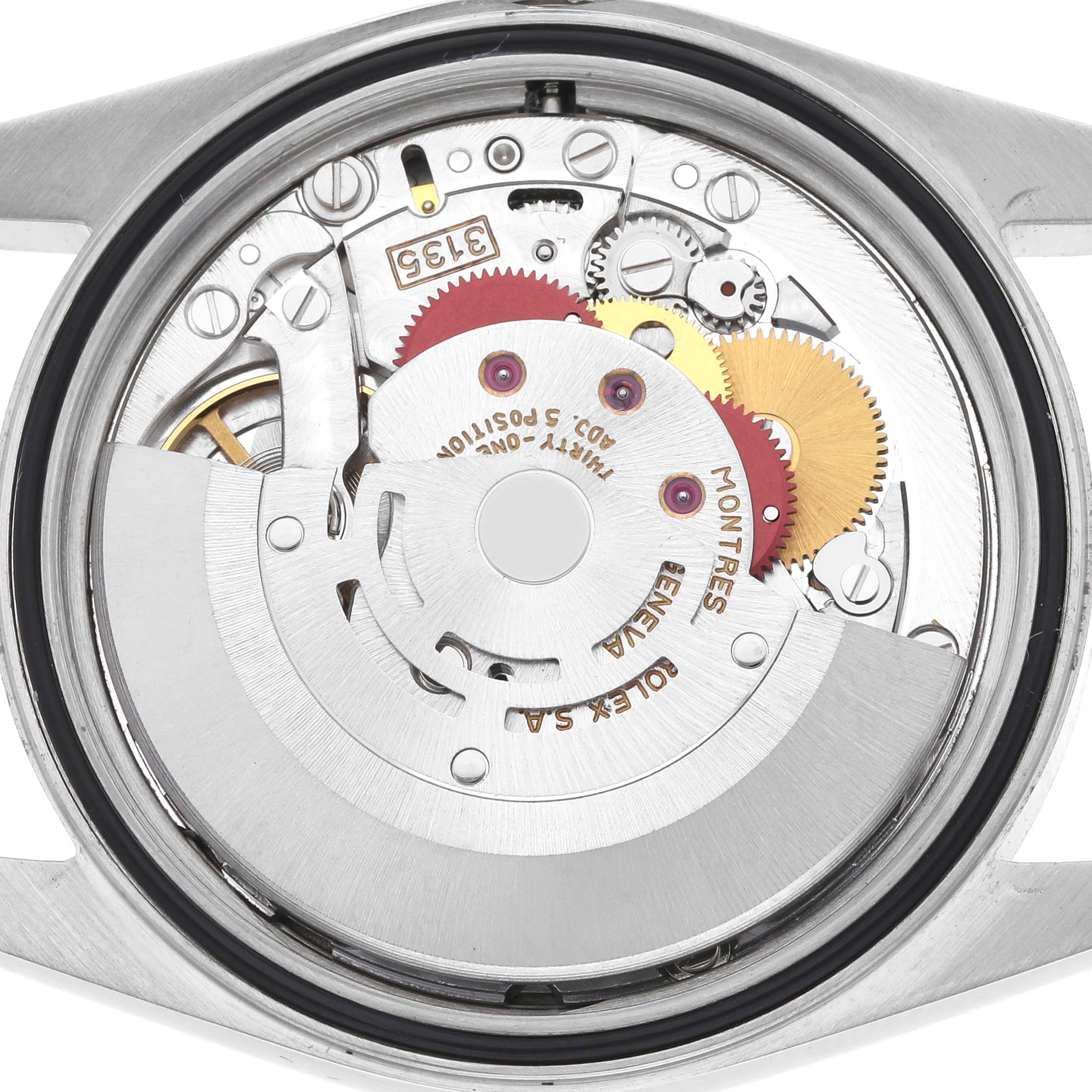 The image shows the internal movement of a Rolex Datejust 16233 Men's Steel and Gold (two tone) Champagne Dial 16233 Men's Steel and Gold (two tone) Champagne Dial watch from a rear angle, highlighting the gears and mechanisms.