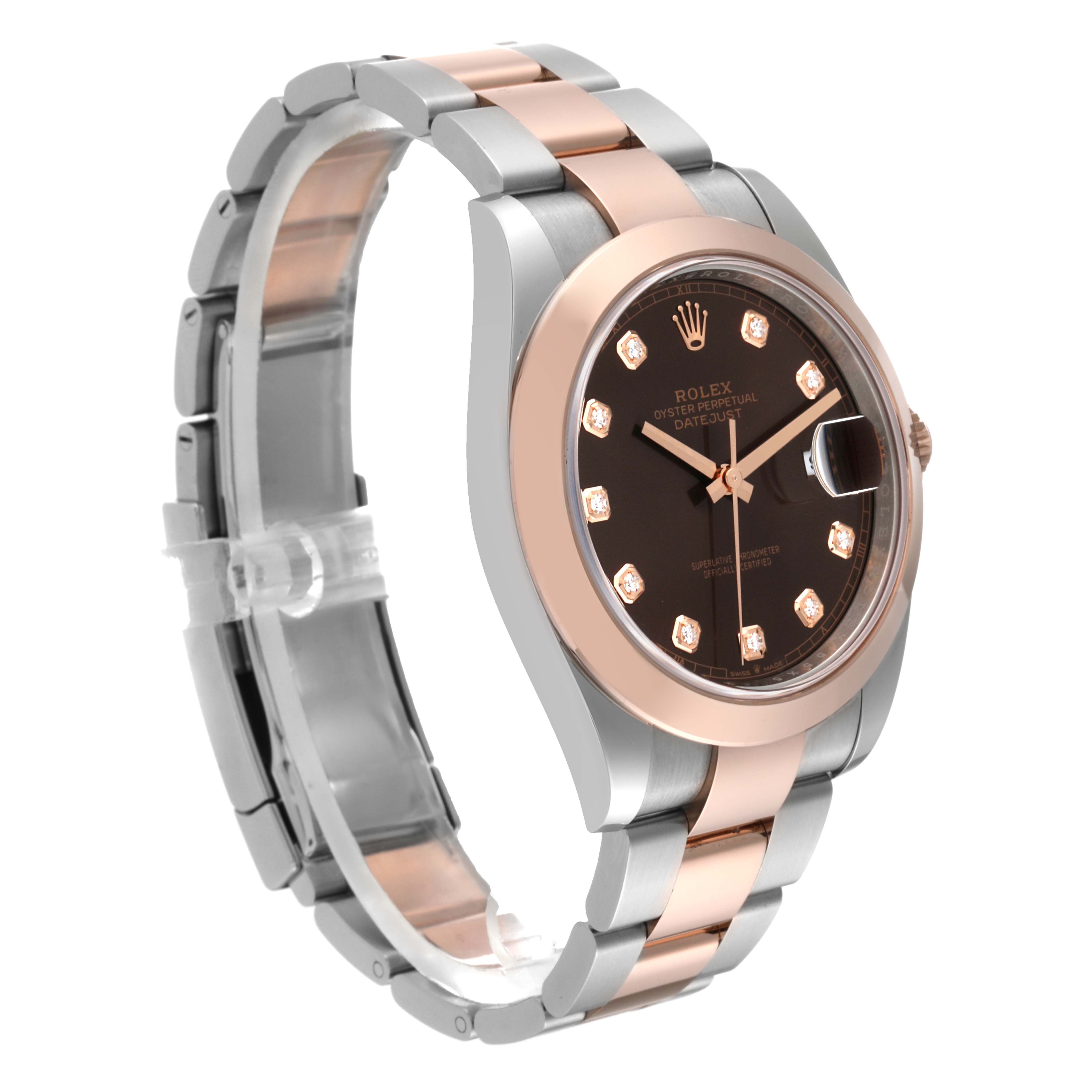The Rolex Datejust 41 126301 Men's Steel and Gold (two tone) Brown Dial 126301 Men's Steel and Gold (two tone) Brown Dial watch is shown at an angled side view, highlighting its two-tone bracelet and dark dial with diamond hour markers.