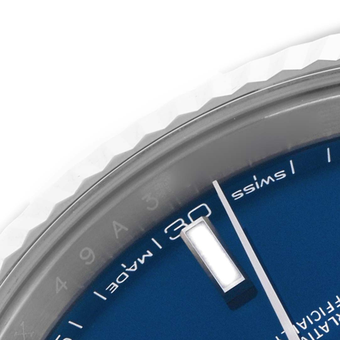The image shows a close-up of the dial and bezel of the Rolex Datejust 41 126334 Men's Stainless Steel Blue Dial 126334 Men's Stainless Steel Blue Dial, highlighting the date and text.