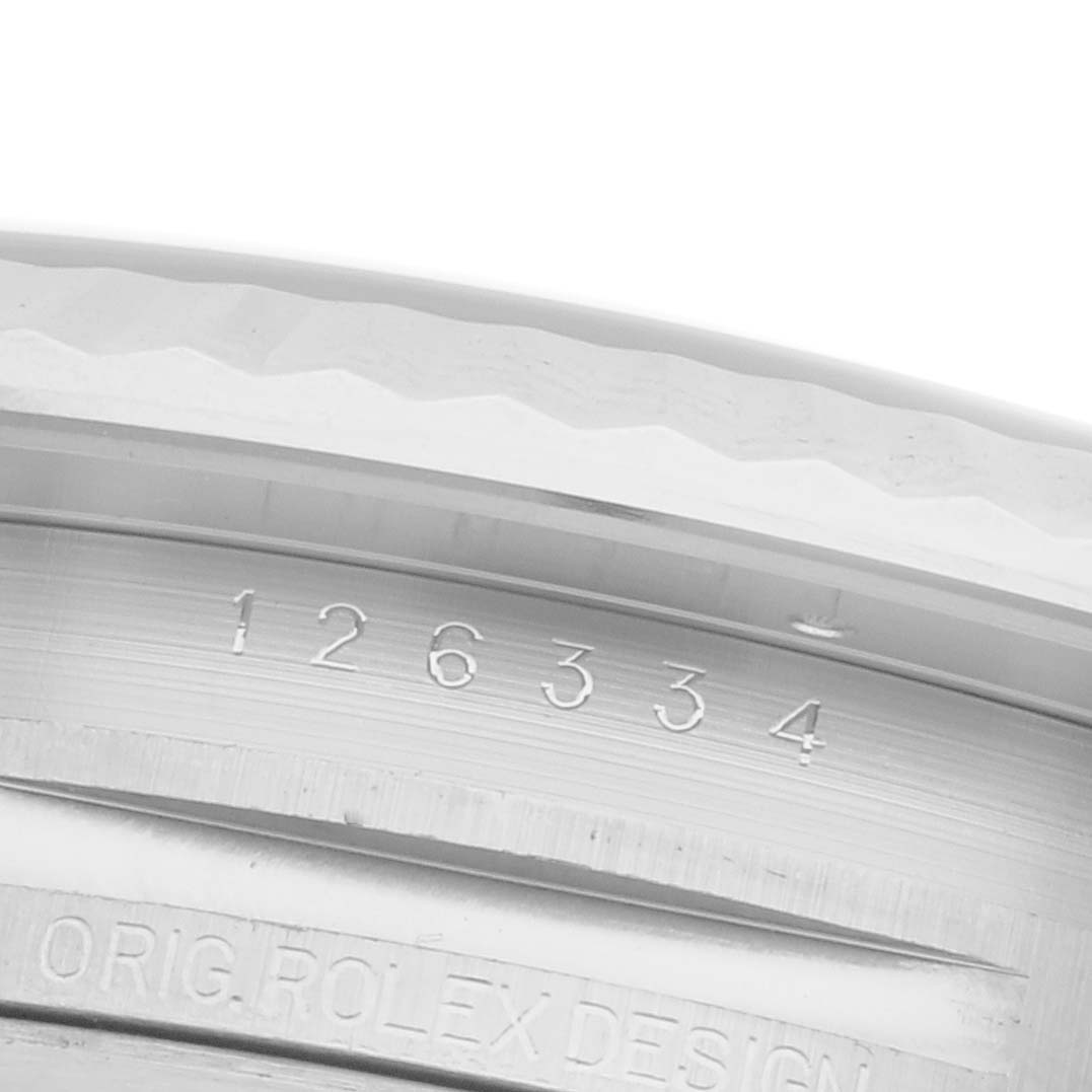 The image shows a detailed close-up of the inner bezel and serial number of a Rolex Datejust 41 126334 Men's Stainless Steel Blue Dial 126334 Men's Stainless Steel Blue Dial watch.