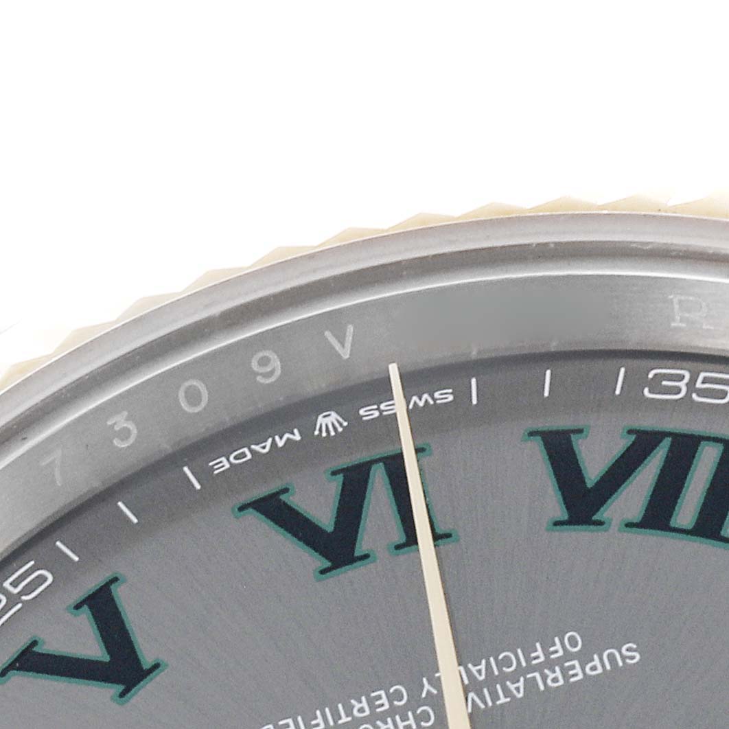 This image shows a close-up of the dial and part of the bezel of the Rolex Datejust 41 126333 Men's Steel and Gold (two tone) Grey Dial 126333 Men's Steel and Gold (two tone) Grey Dial, focusing on the Roman numeral markers.