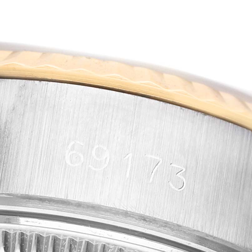 The image shows a close-up of the side profile of the Rolex Datejust 69173 Women's Stainless Steel Champagne Dial, specifically highlighting the case edge and model number.