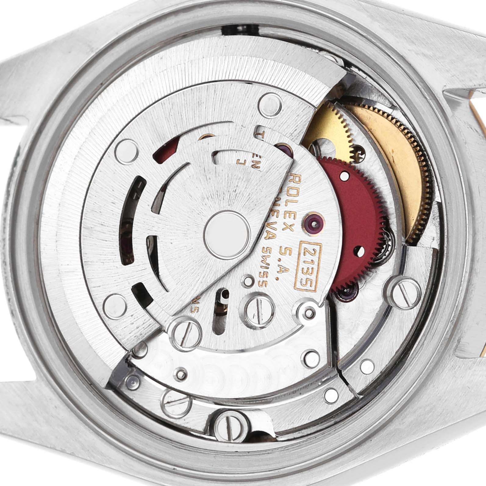 The image shows the movement mechanism of a Rolex Datejust 69173 Women's Stainless Steel Champagne Dial watch viewed from the back, highlighting gears and engravings.