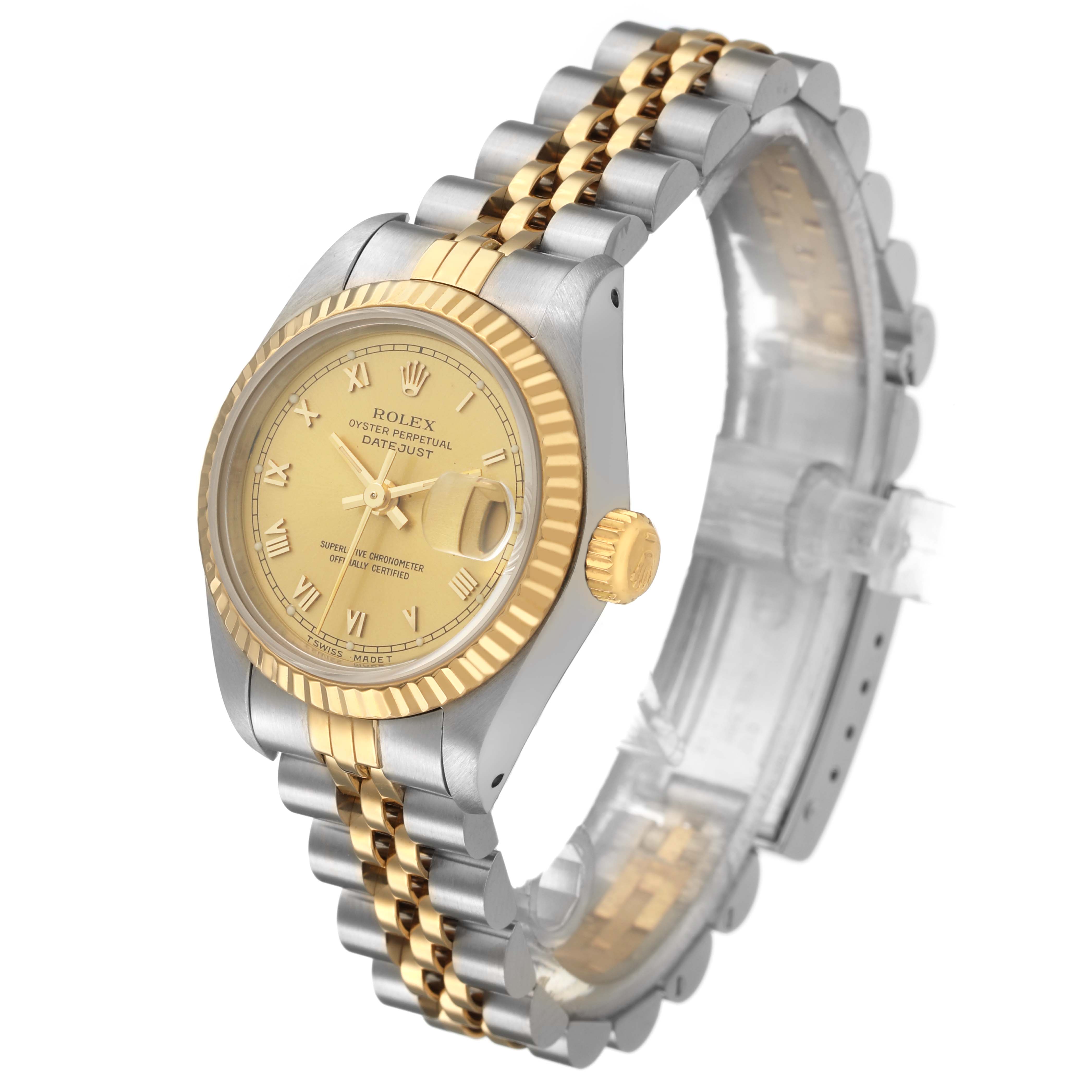 The Rolex Datejust 69173 Women's Stainless Steel Champagne Dial watch is shown at an angled view, highlighting its face, bezel, and two-tone bracelet.