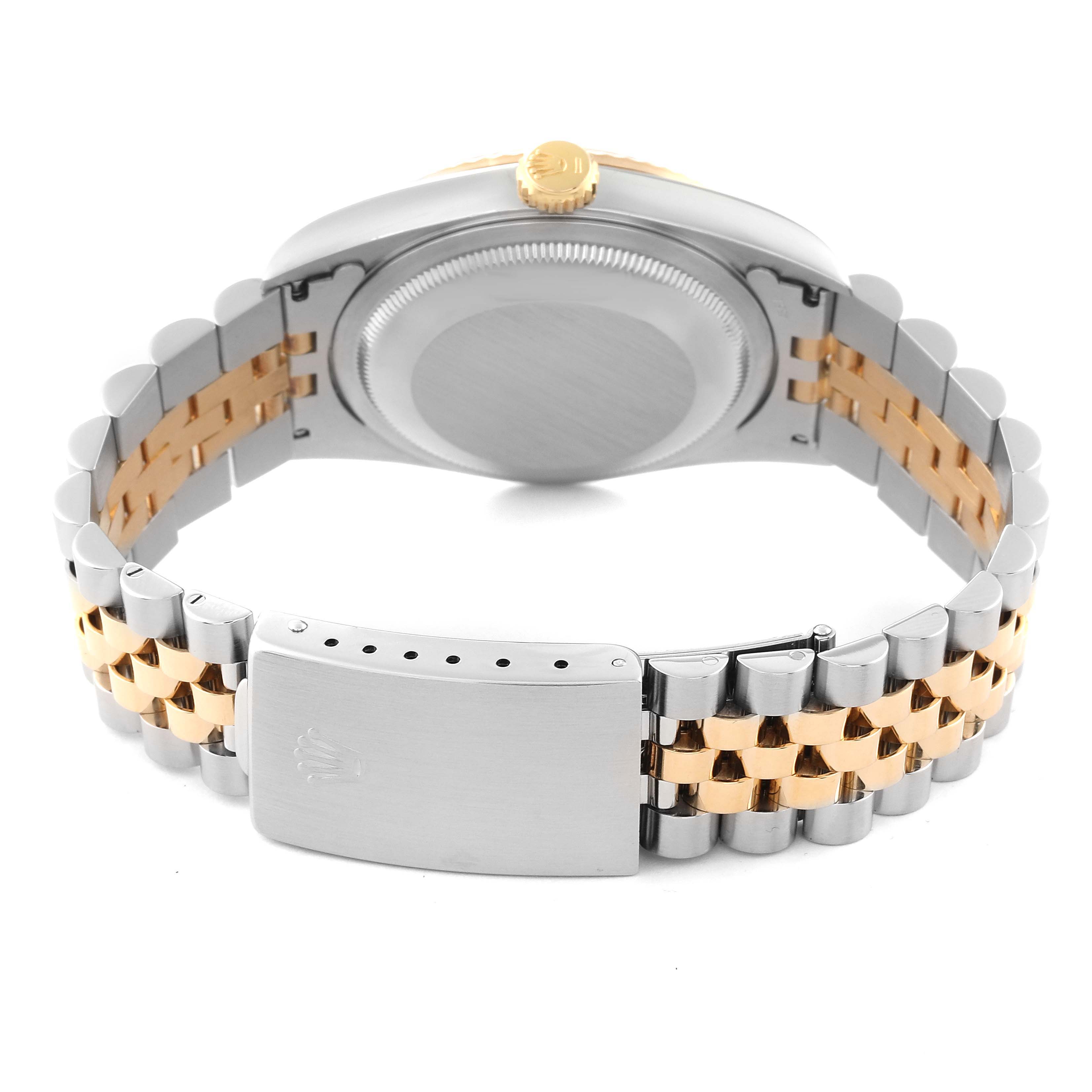 The image shows the back of a Rolex Datejust 16233 Men's Steel and Gold (two tone) Champagne Dial 16233 Men's Steel and Gold (two tone) Champagne Dial watch, highlighting the clasp, bracelet, and caseback.