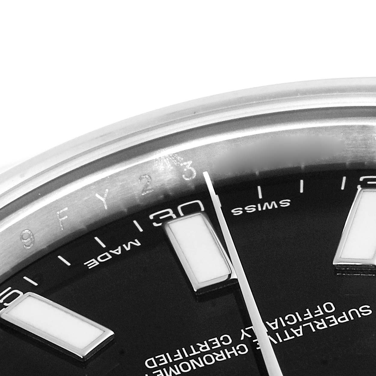 This image shows a close-up angle of the dial and markers on a Rolex Datejust 41 116300 Men
s Stainless Steel Black Dial 116300 Men
s Stainless Steel Black Dial, highlighting the "SWISS MADE" text and the minute markers.