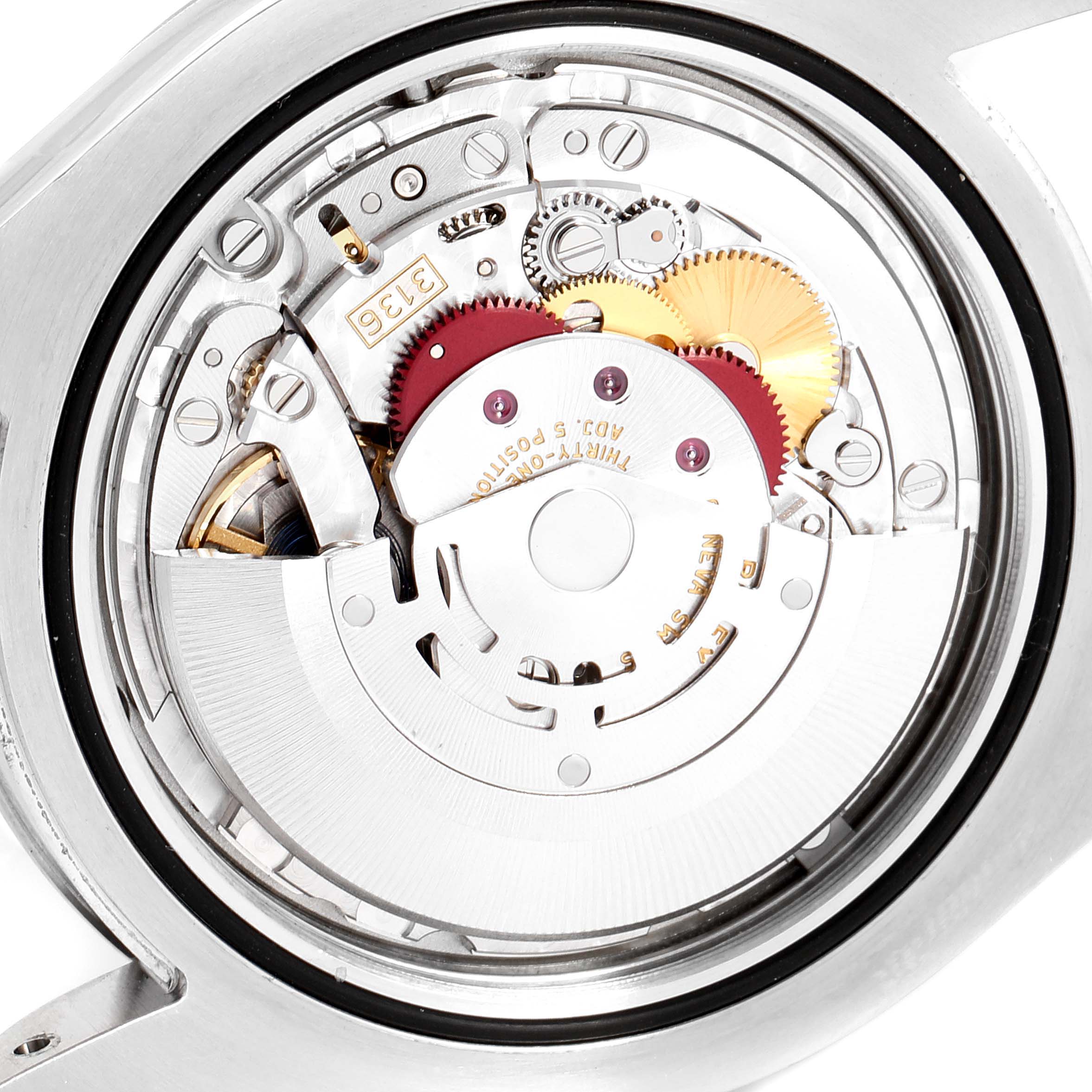 This image shows a close-up view of the movement mechanism inside a Rolex Datejust 41 116334 Men
s Stainless Steel White Dial 116334 Men
s Stainless Steel White Dial watch.