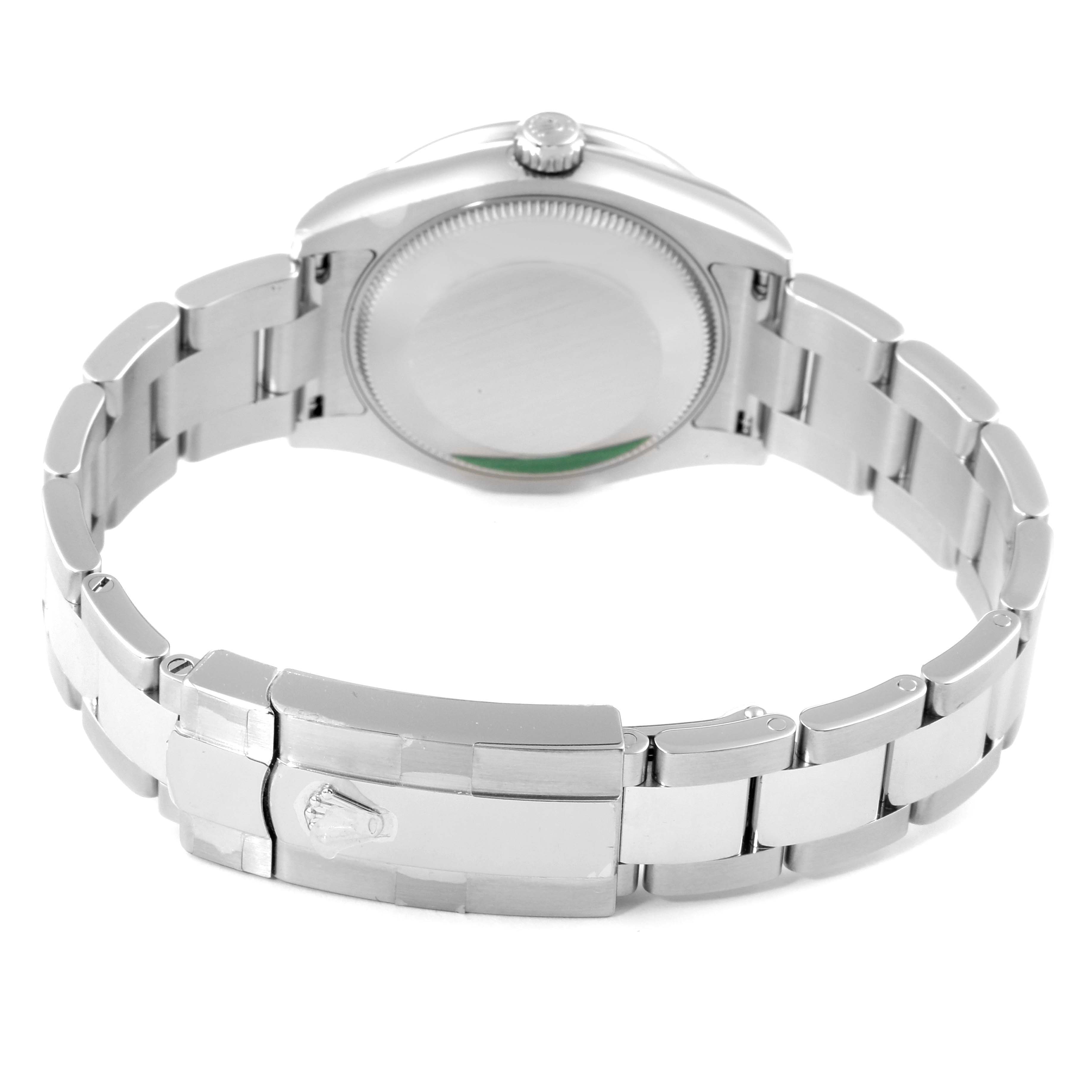 The image shows the back case and bracelet of a Mid-Size Rolex watch from a rear angle.