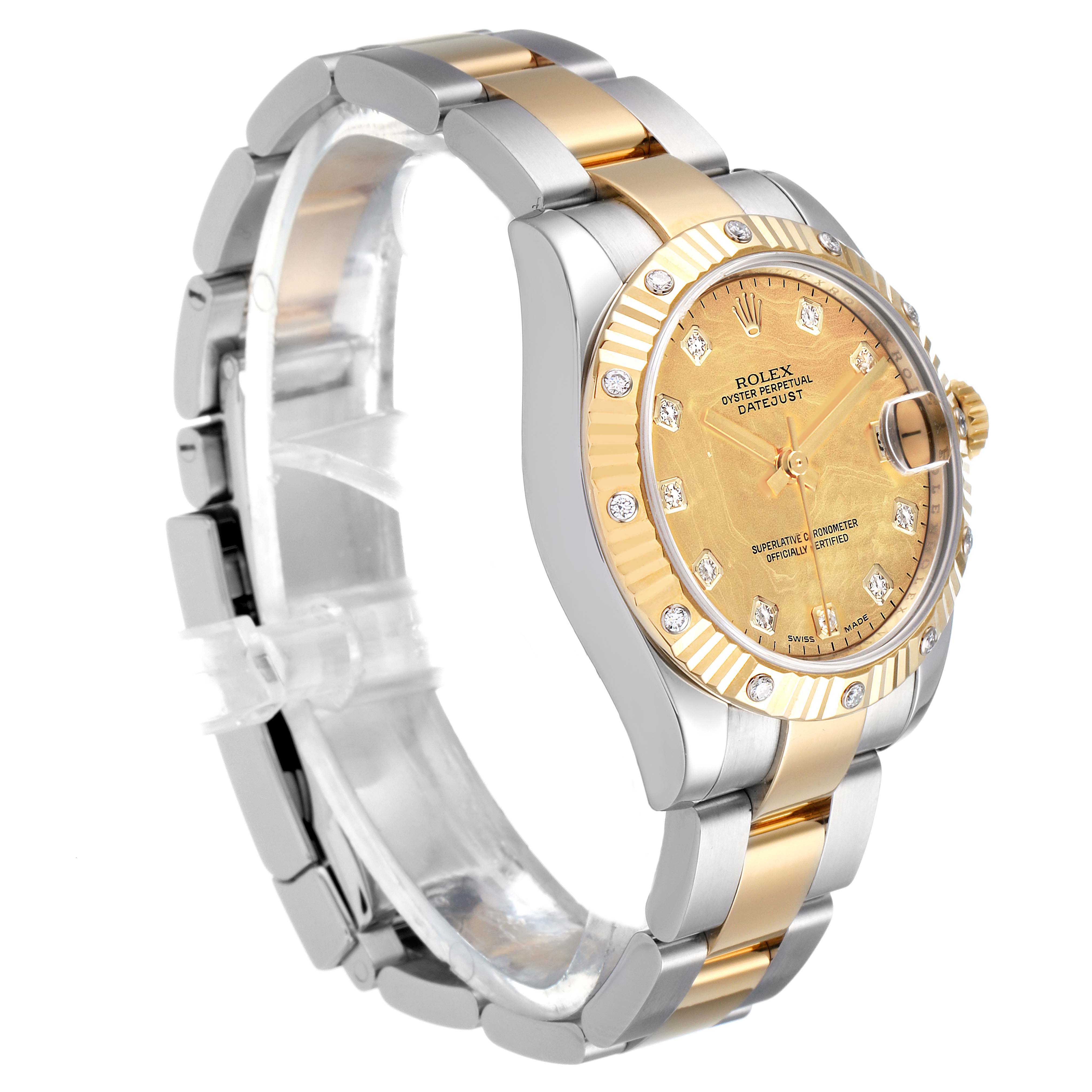The Rolex Mid-Size 178313 Women's Steel and Gold (two tone) Mother of Pearl Dial 178313 Women's Steel and Gold (two tone) Mother of Pearl Dial watch is shown from an angled side view, highlighting the gold bezel, dial, and two-tone bracelet.