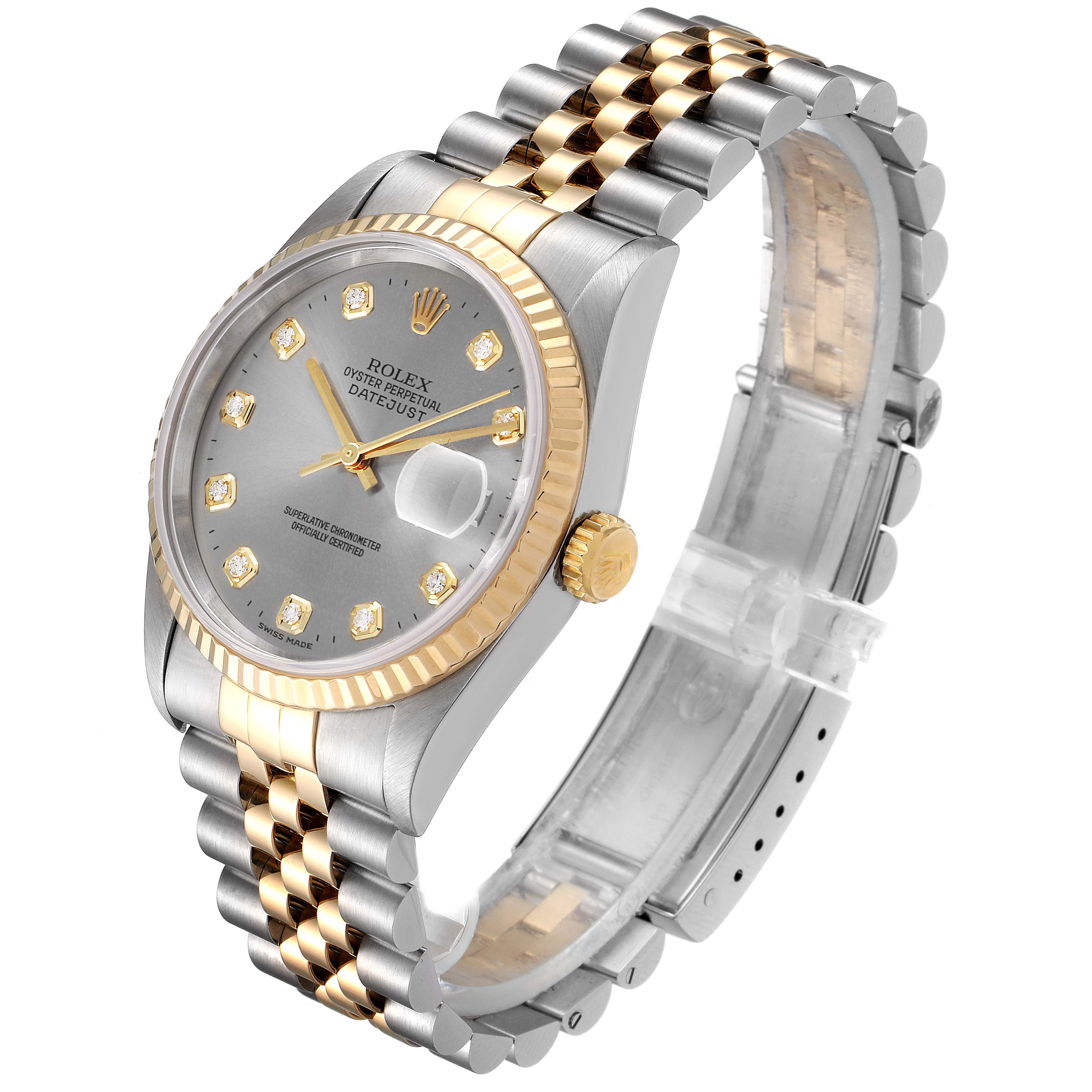 The Rolex Datejust 16233 Men
s Steel and Gold (two tone) Grey Dial 16233 Men
s Steel and Gold (two tone) Grey Dial is shown at a three-quarter angle, displaying its silver and gold two-tone bracelet, dial, and date window with cyclops lens.