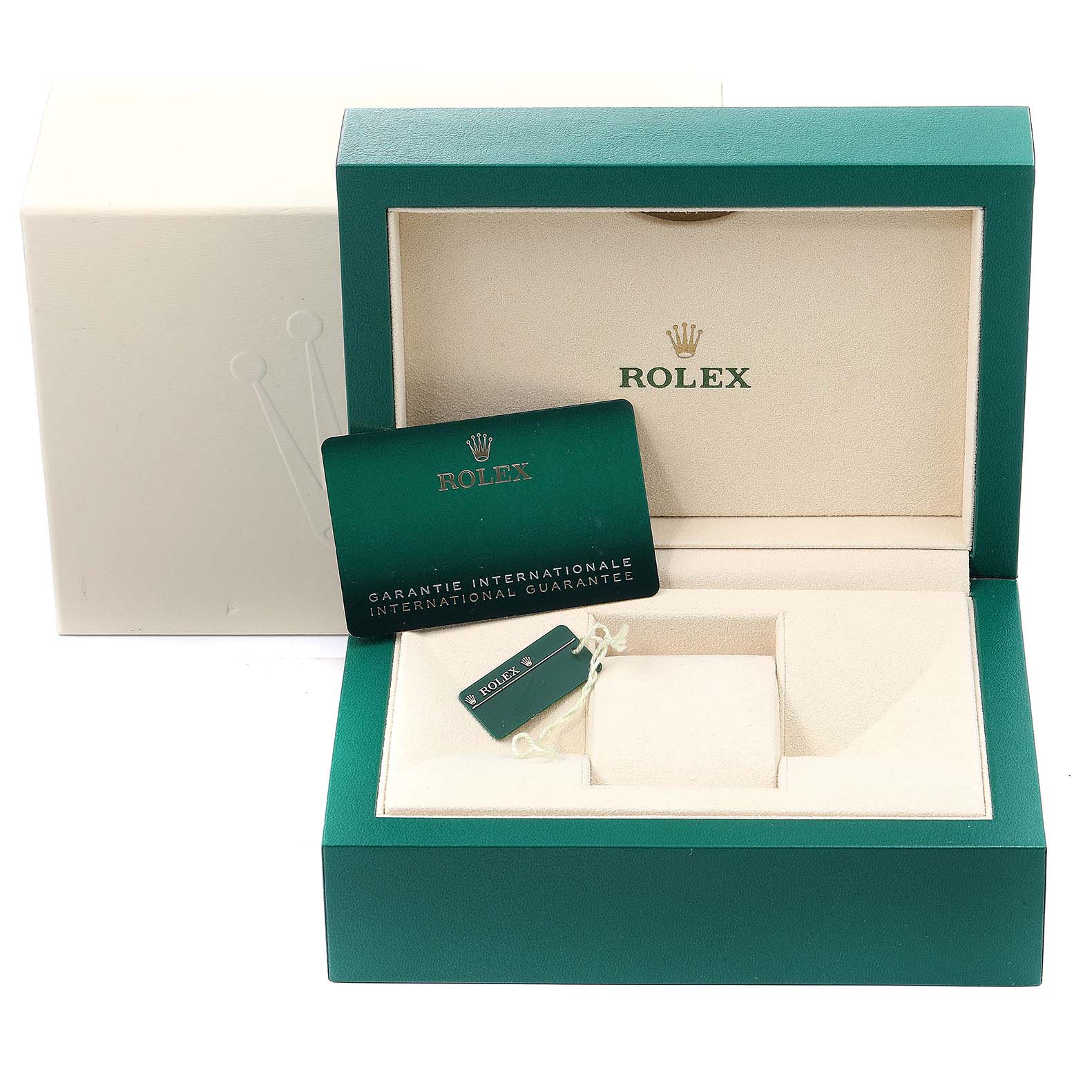 This image shows the open box of a Rolex Datejust 179384 Women's Stainless Steel Mother of Pearl Dial 179384 Women's Stainless Steel Mother of Pearl Dial with international guarantee card and tags.