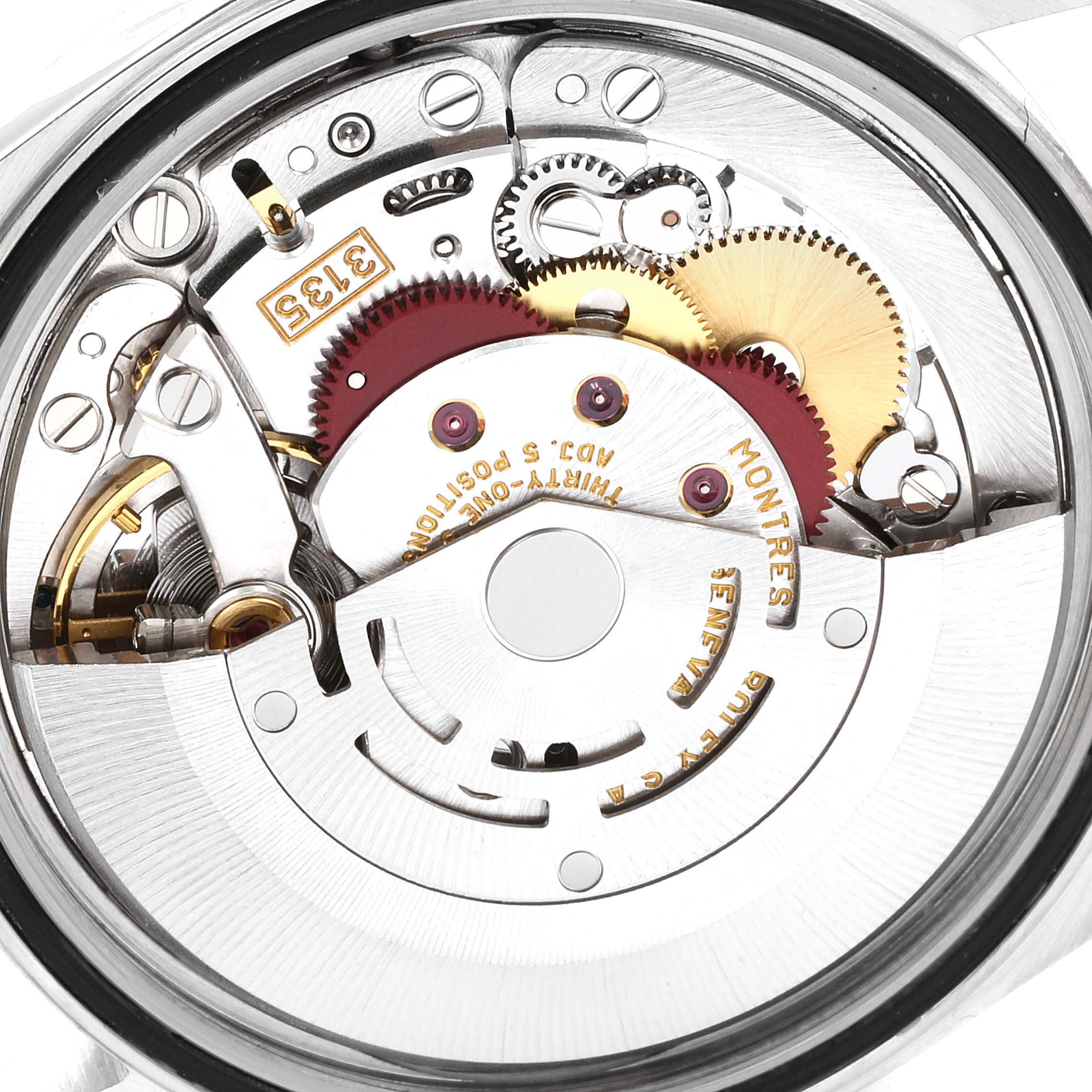 The image shows the internal mechanism of a Rolex Datejust 16233 Men's Steel and Gold (two tone) Black Dial 16233 Men's Steel and Gold (two tone) Black Dial watch taken from a back angle.