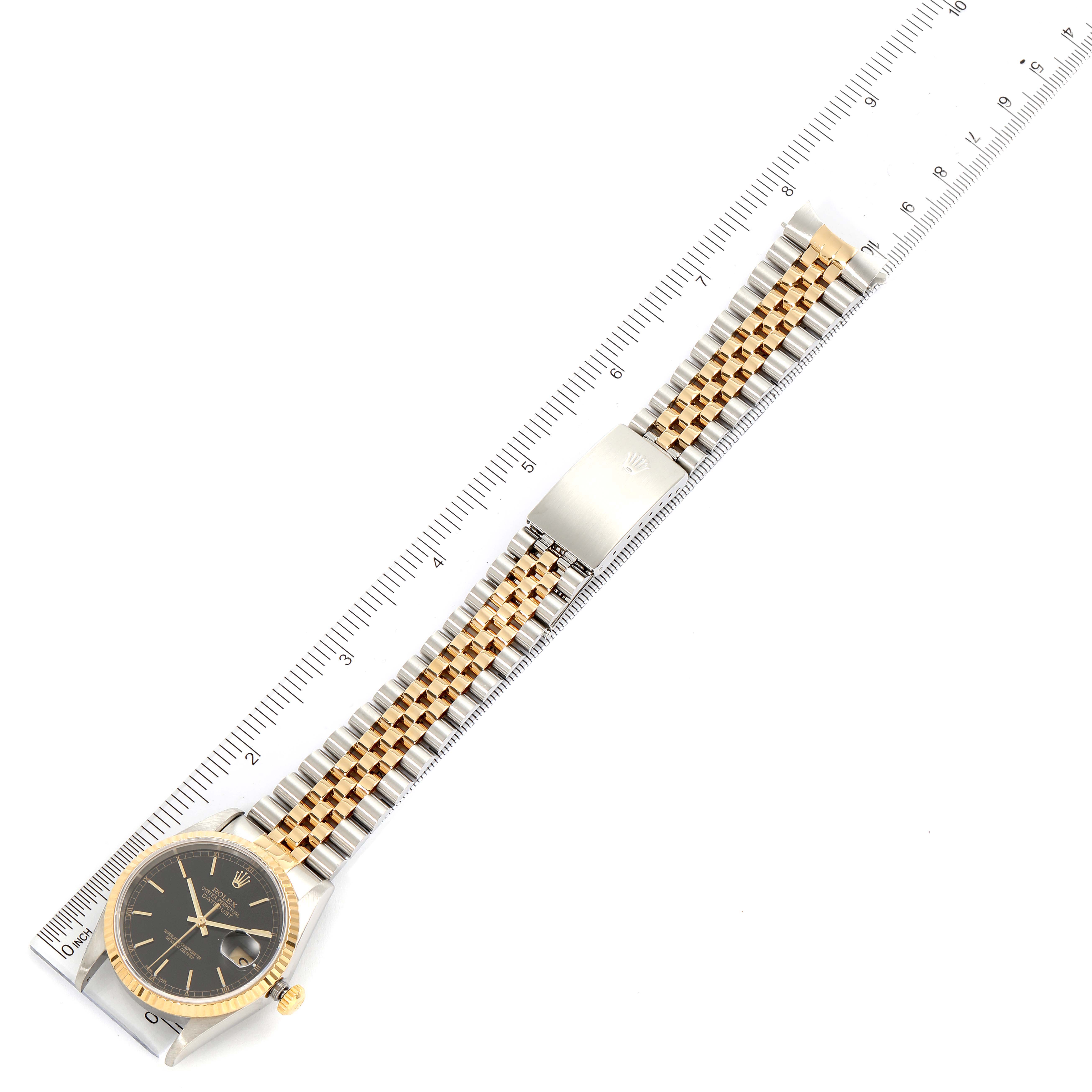 The Rolex Datejust 16233 Men's Steel and Gold (two tone) Black Dial 16233 Men's Steel and Gold (two tone) Black Dial watch is shown from a top-down angle, displaying the entire watch including the case, dial, bezel, and jubilee bracelet.