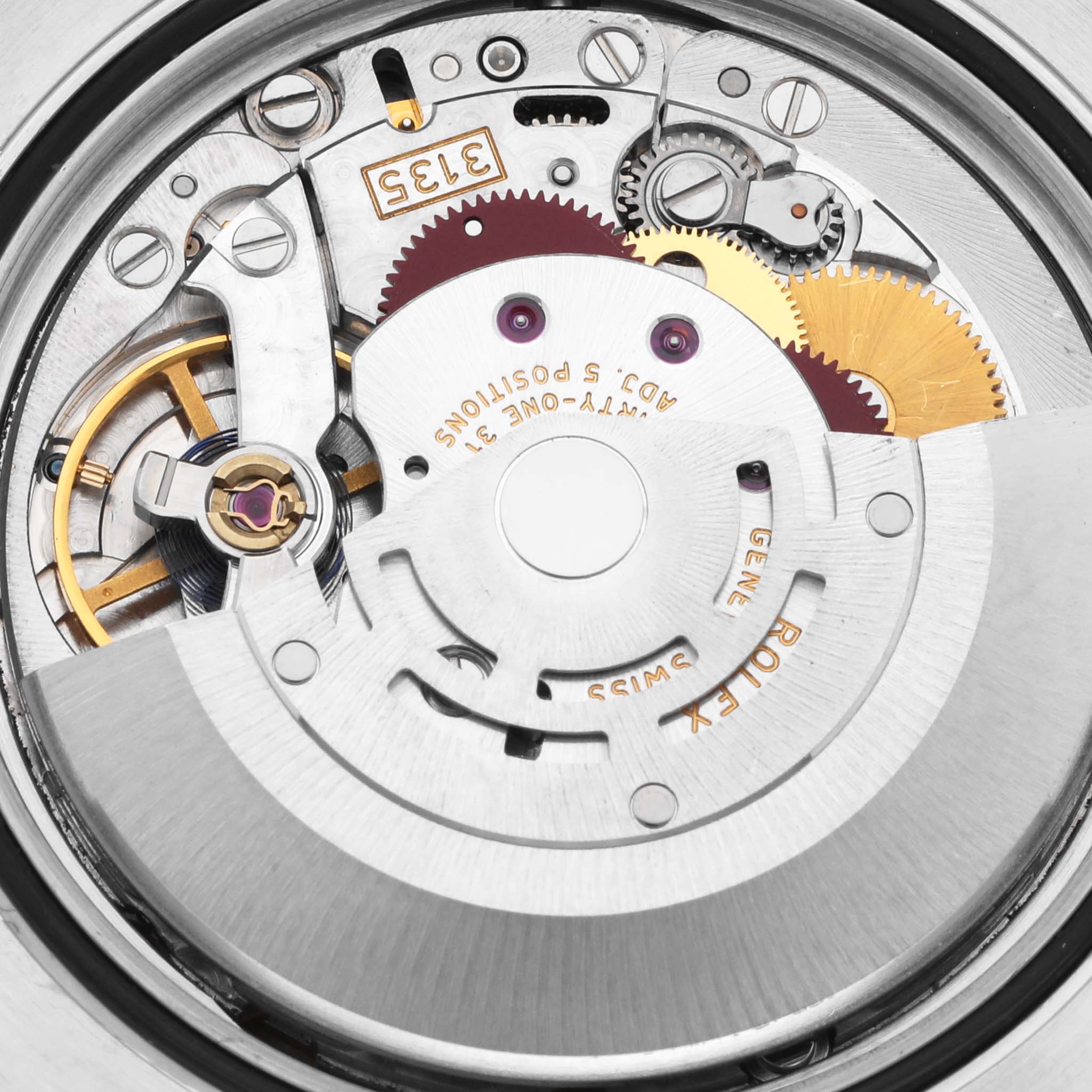 The image shows the movement mechanism of a Rolex Datejust 116233 Men's Steel and Gold (two tone) Champagne Dial 116233 Men's Steel and Gold (two tone) Champagne Dial, viewed from the back, highlighting gears and components.