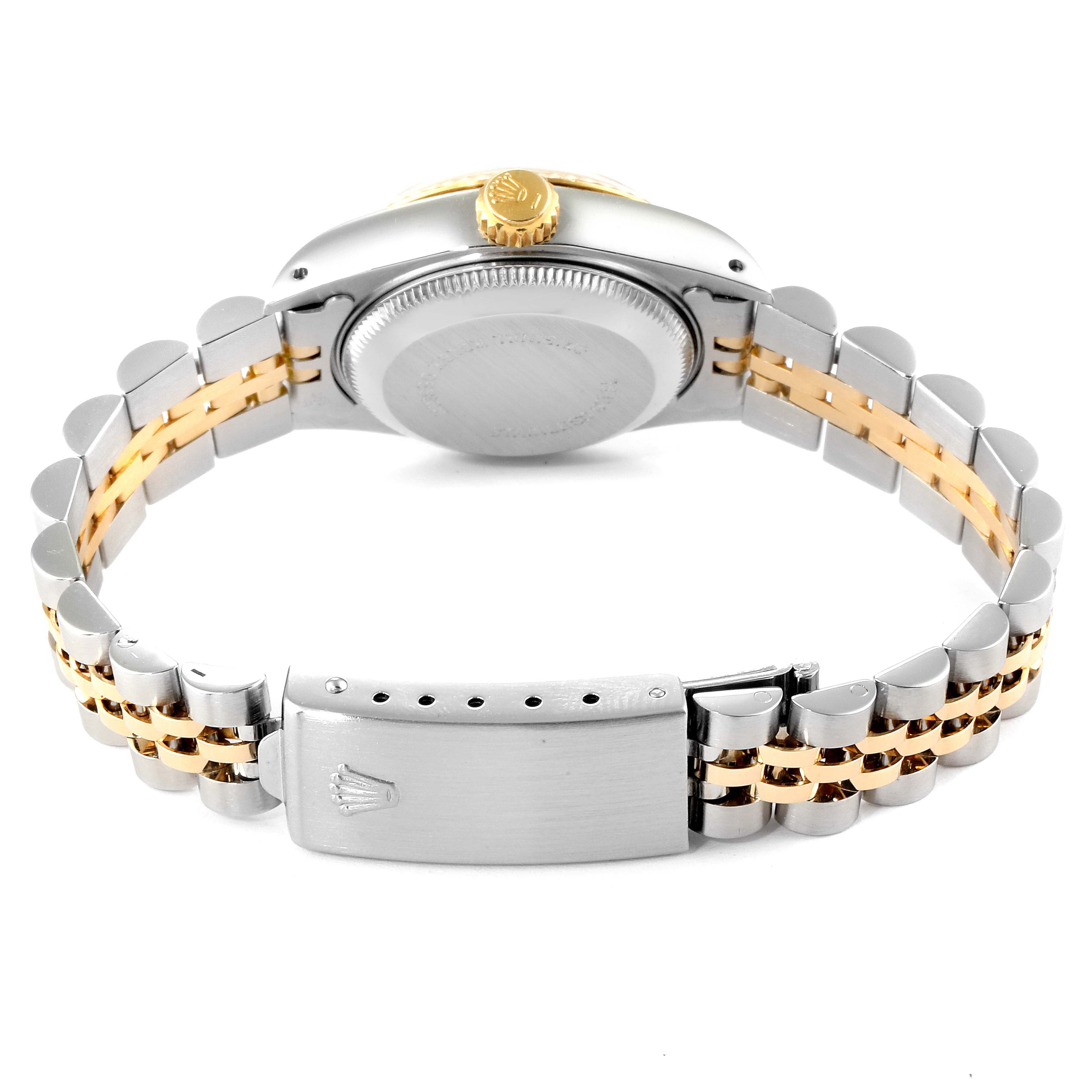 A rear angle view of a Rolex Datejust 69173 Women's Stainless Steel Champagne Dial 69173 Women's Stainless Steel Champagne Dial watch, showcasing the bracelet, clasp, case back, and crown.