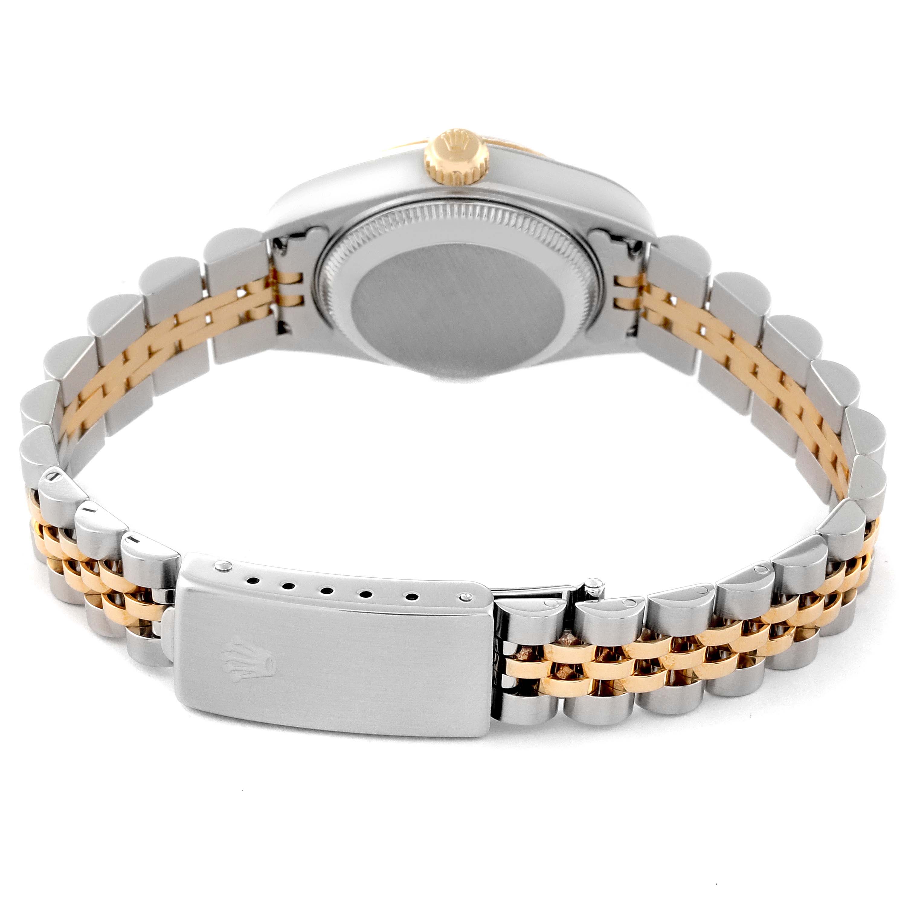 This image shows the back view of a Rolex Datejust 79173 Women's Steel and Gold (two tone) Green Dial 79173 Women's Steel and Gold (two tone) Green Dial watch, focusing on its bicolored bracelet and clasp.