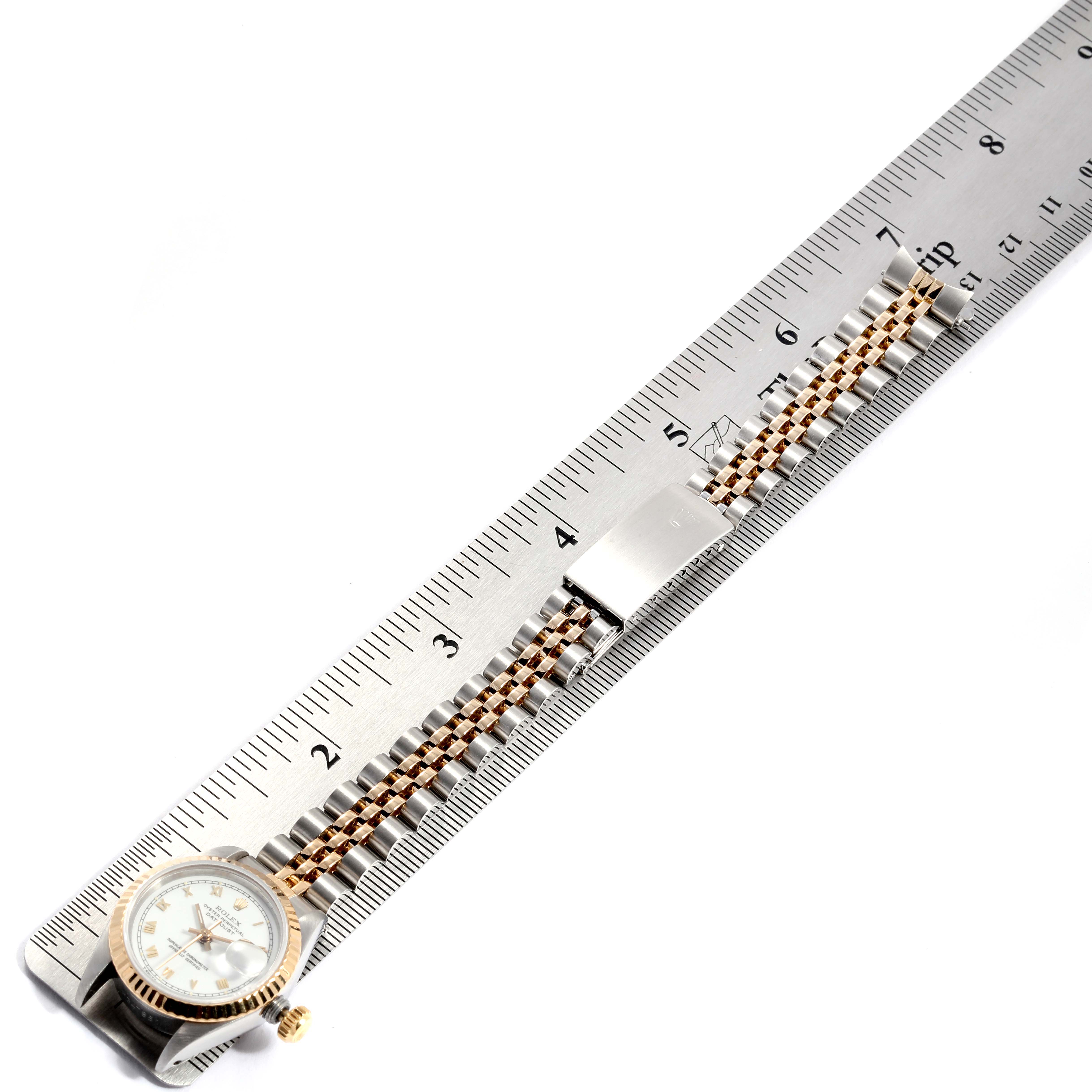 The Rolex Datejust 69173 Women
s Stainless Steel White Dial 69173 Women
s Stainless Steel White Dial watch is shown from a top-down angle, highlighting the full bracelet and clasp.