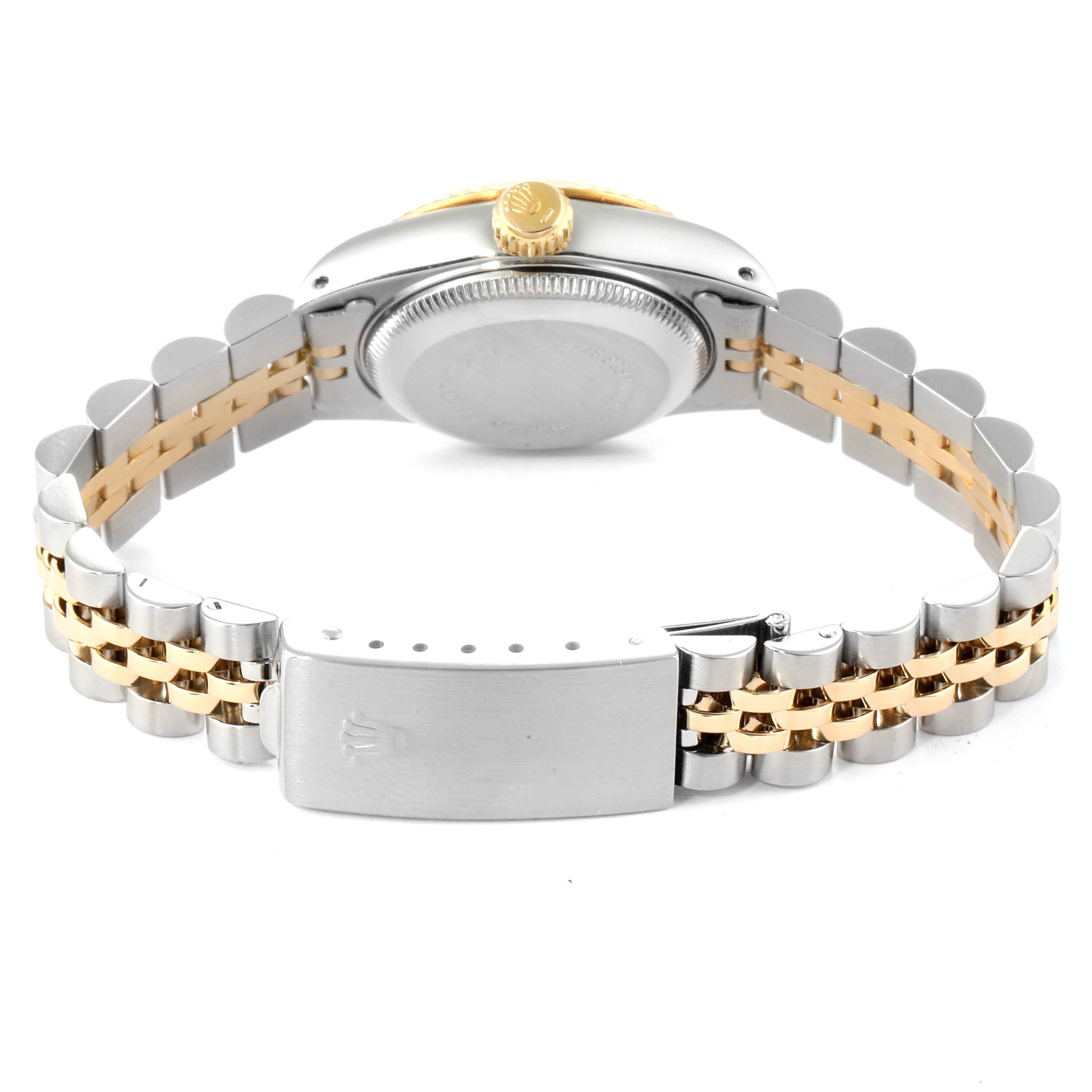 This Rolex Datejust 69173 Women
s Stainless Steel White Dial 69173 Women
s Stainless Steel White Dial is shown from the back, displaying the case back, clasp, and jubilee bracelet.