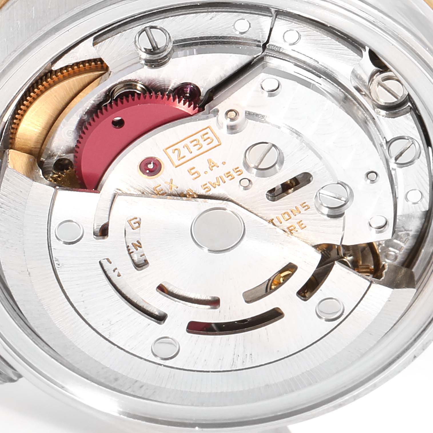 Close-up of the Rolex Datejust 69173 Women
s Stainless Steel White Dial 69173 Women
s Stainless Steel White Dial movement, revealing the intricate interior components and gears.
