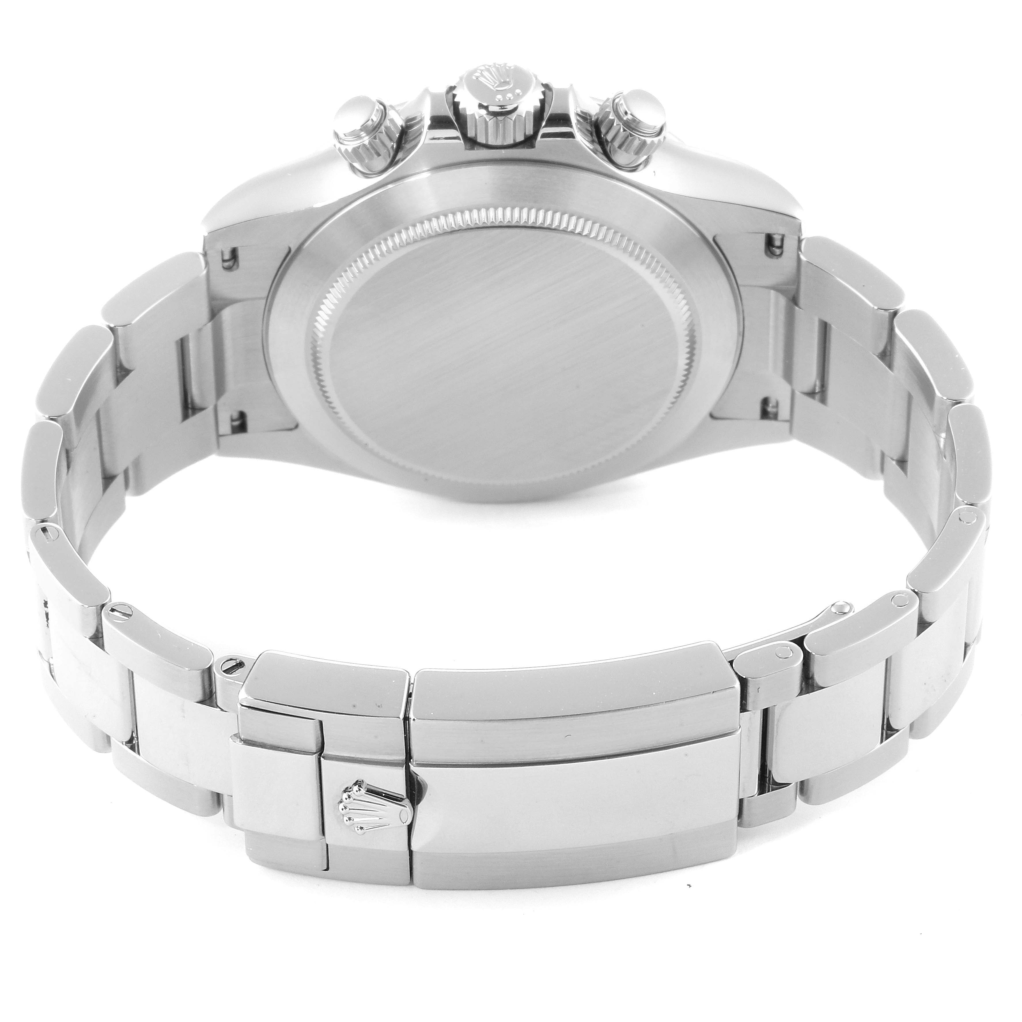 The image shows the back view, crown, chronograph pushers, and Oyster bracelet of a Rolex Daytona 116520 Men's Stainless Steel Black Dial 116520 Men's Stainless Steel Black Dial watch.