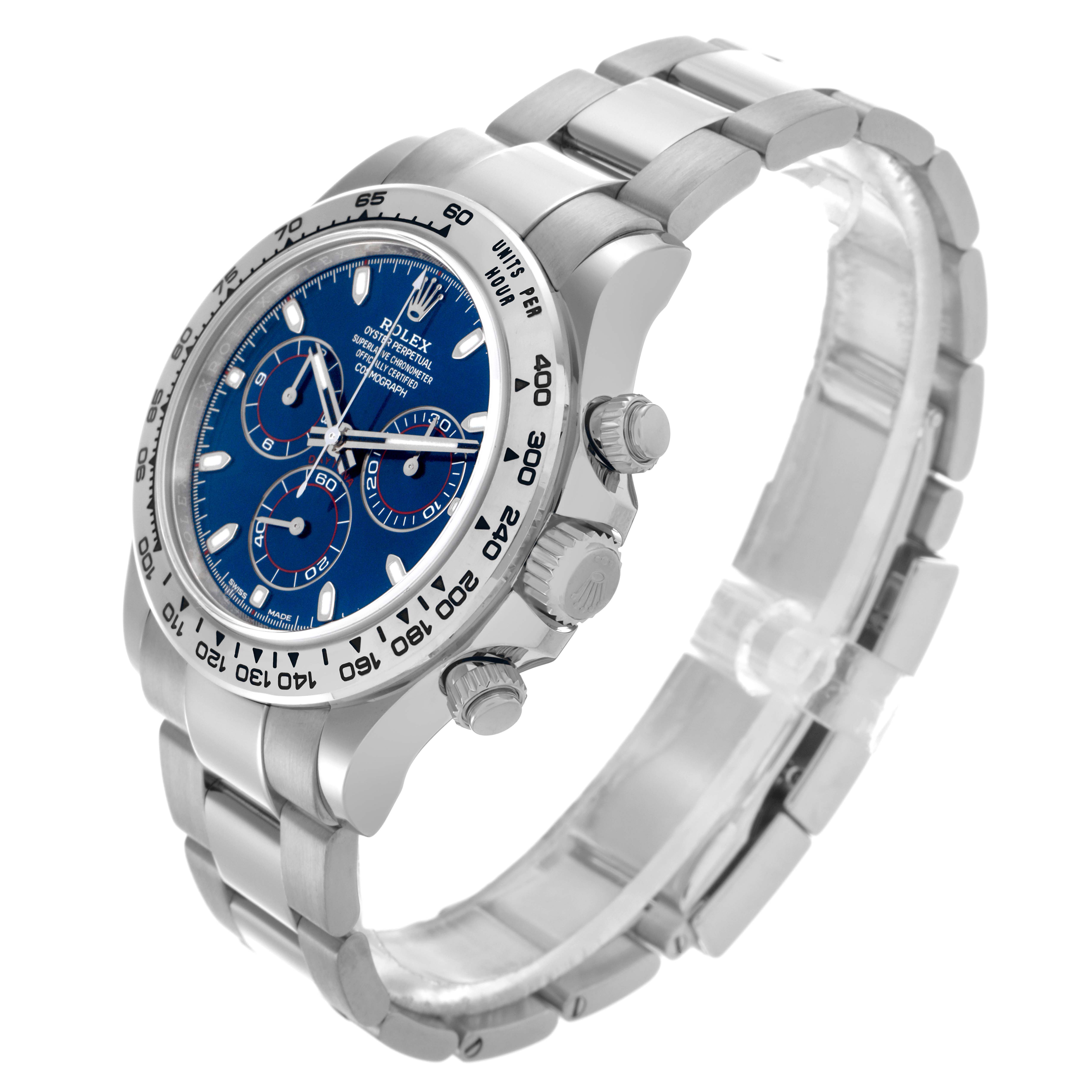 The Rolex Daytona 116509 Men's White Gold Blue Dial 116509 Men's White Gold Blue Dial watch is shown at a three-quarter angle, highlighting the face, bezel, crown, pushers, and bracelet.